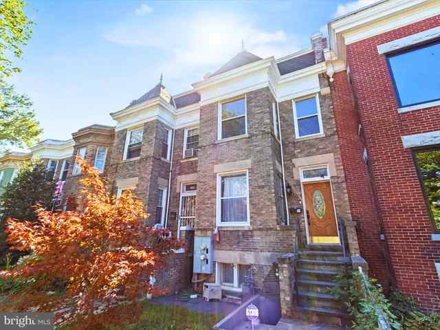 a front view of a multi story residential apartment building