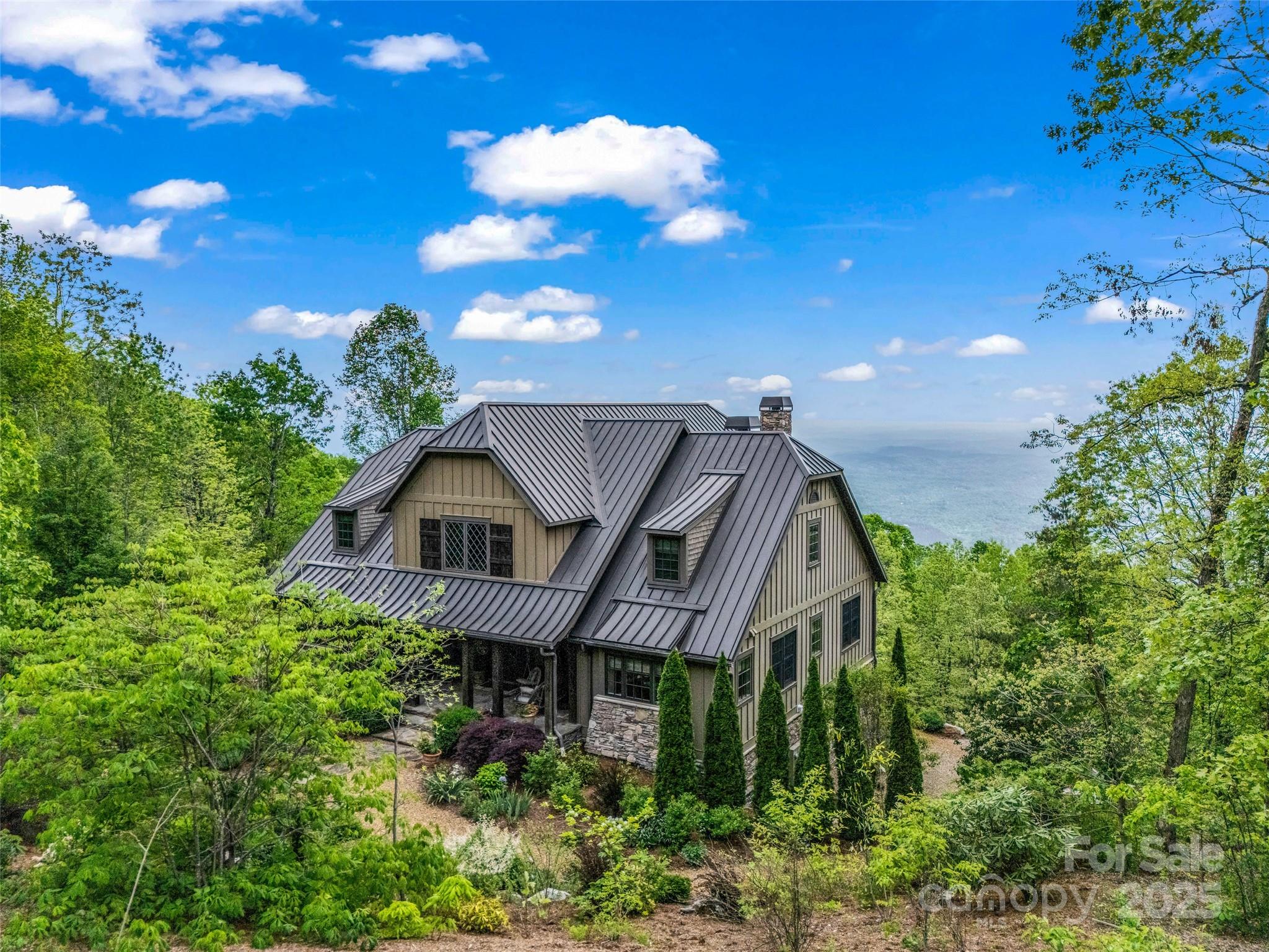 a house view with a garden space