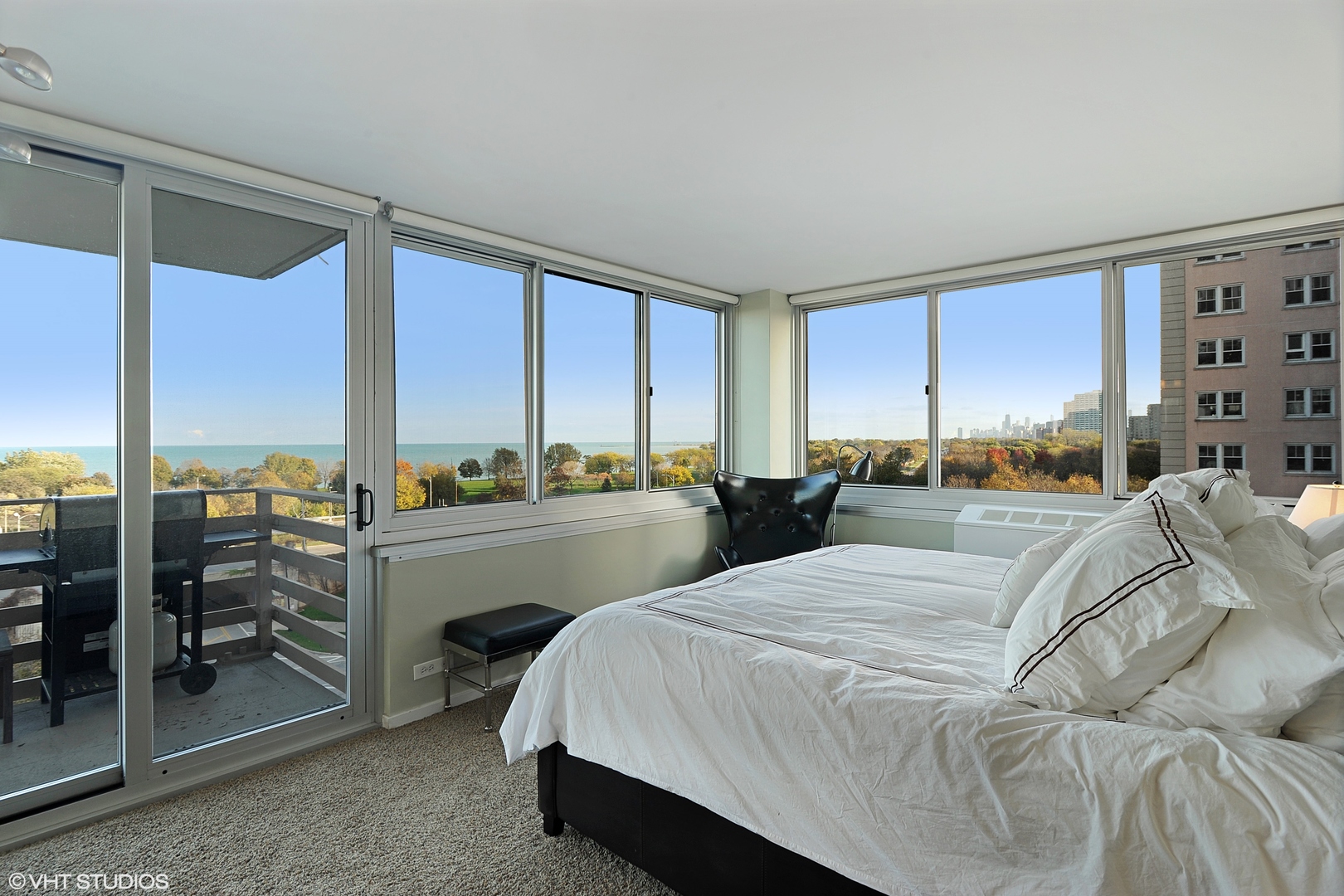 5601 North Sheridan Road, Unit 7A Chicago, IL 60660 - Photo 11 of 15 a bed room with a bed and a large window