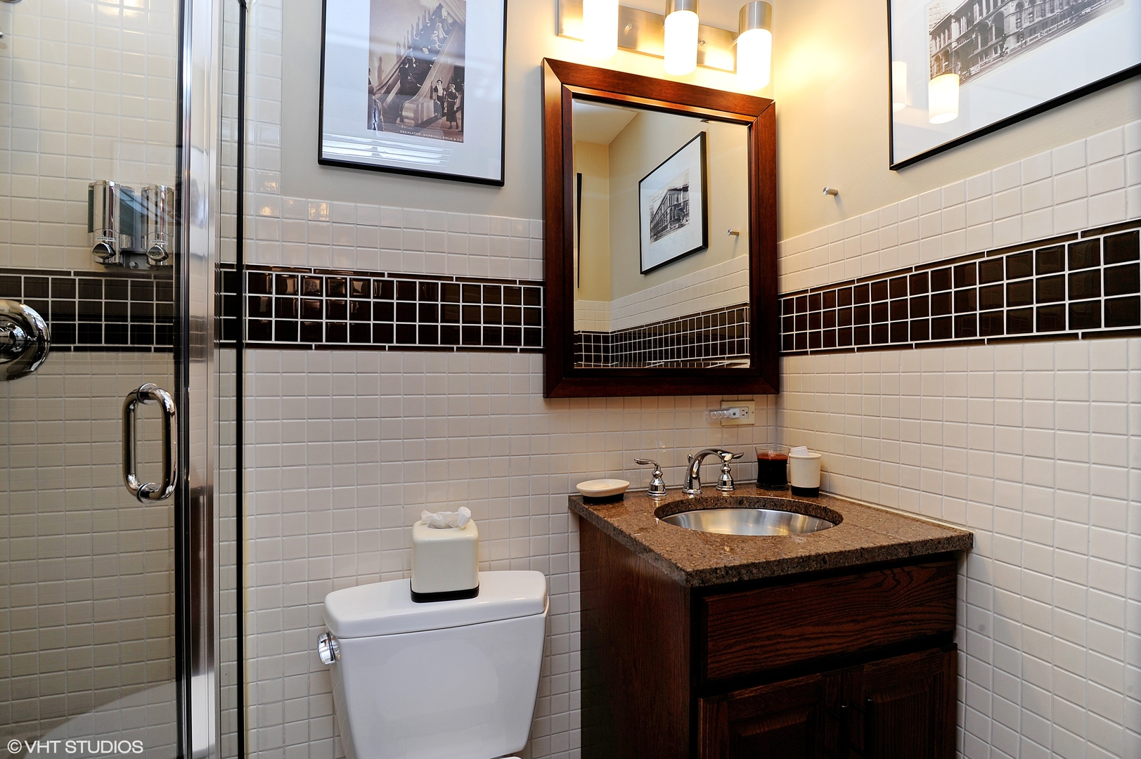 5601 North Sheridan Road, Unit 7A Chicago, IL 60660 - Photo 14 of 15 a bathroom with a sink toilet and shower