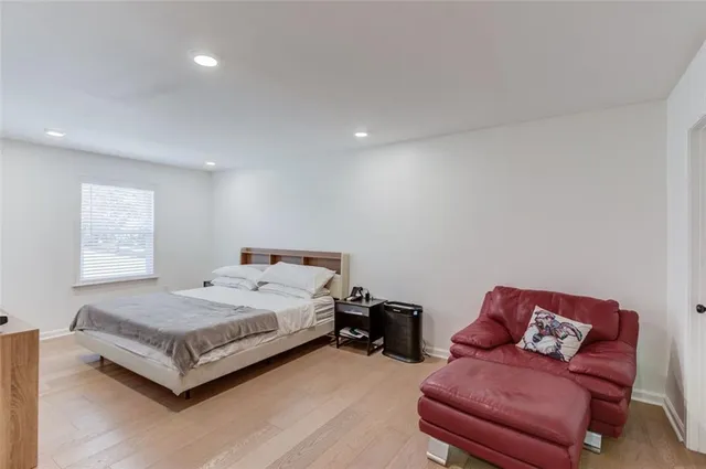 a bed room with a bed and a couch