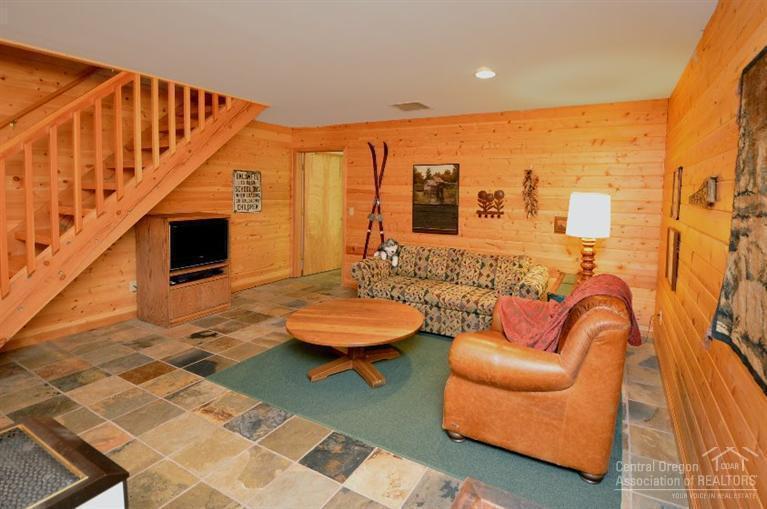 69762 Camp Polk Road Sisters, OR 97759 - Photo 19 of 24 Ground level family room, tiled floor