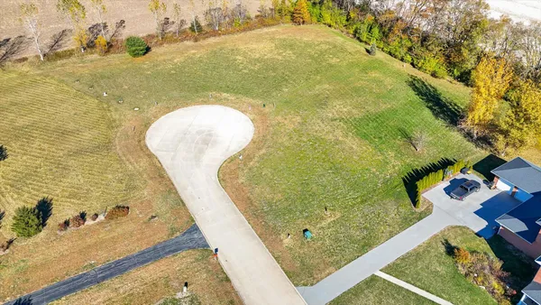 a view of a playground with green space