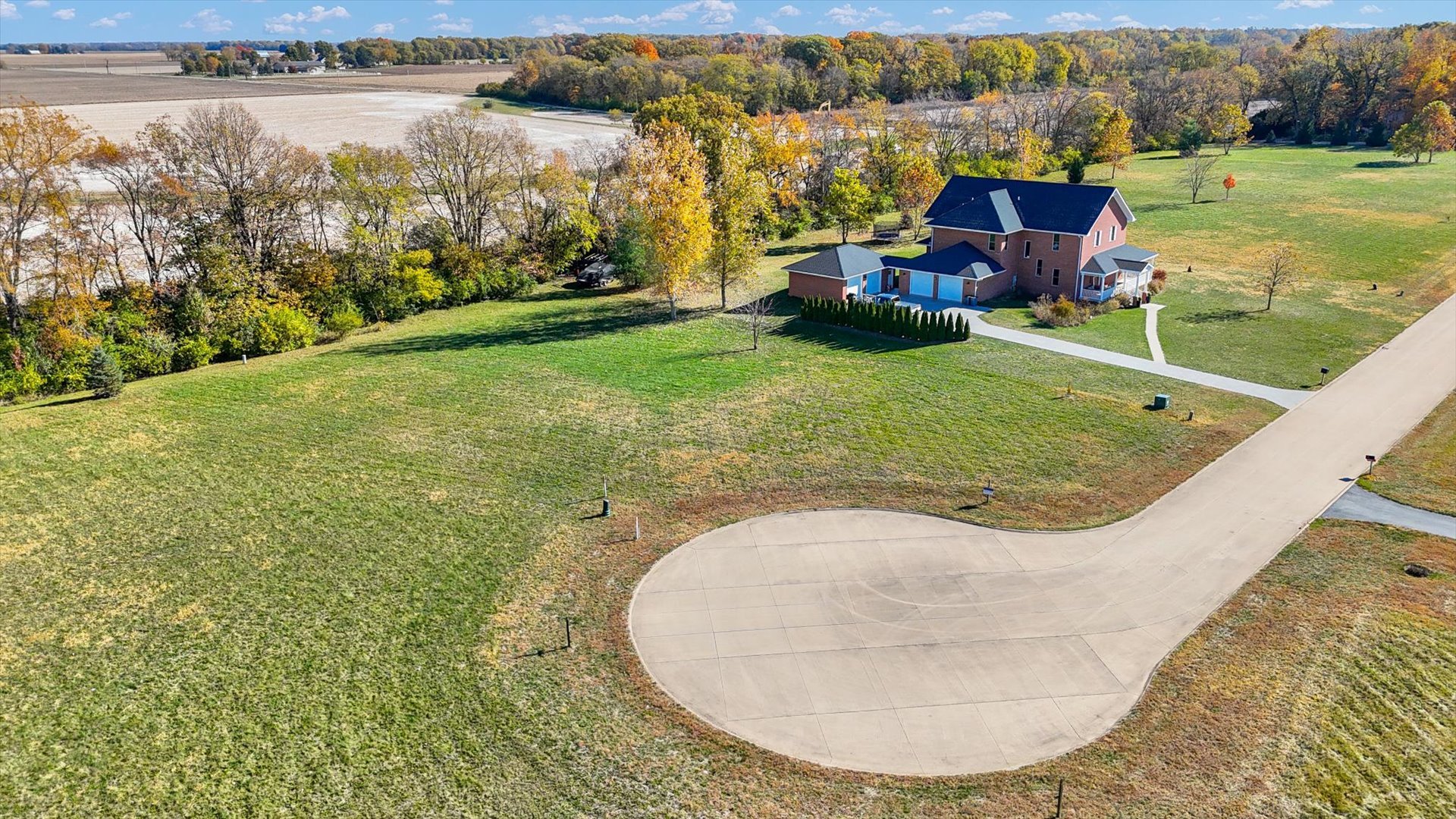 3002 Brickhouses Road Urbana, IL 61802 - Photo 13 of 19 an aerial view of a house with a yard and lake view