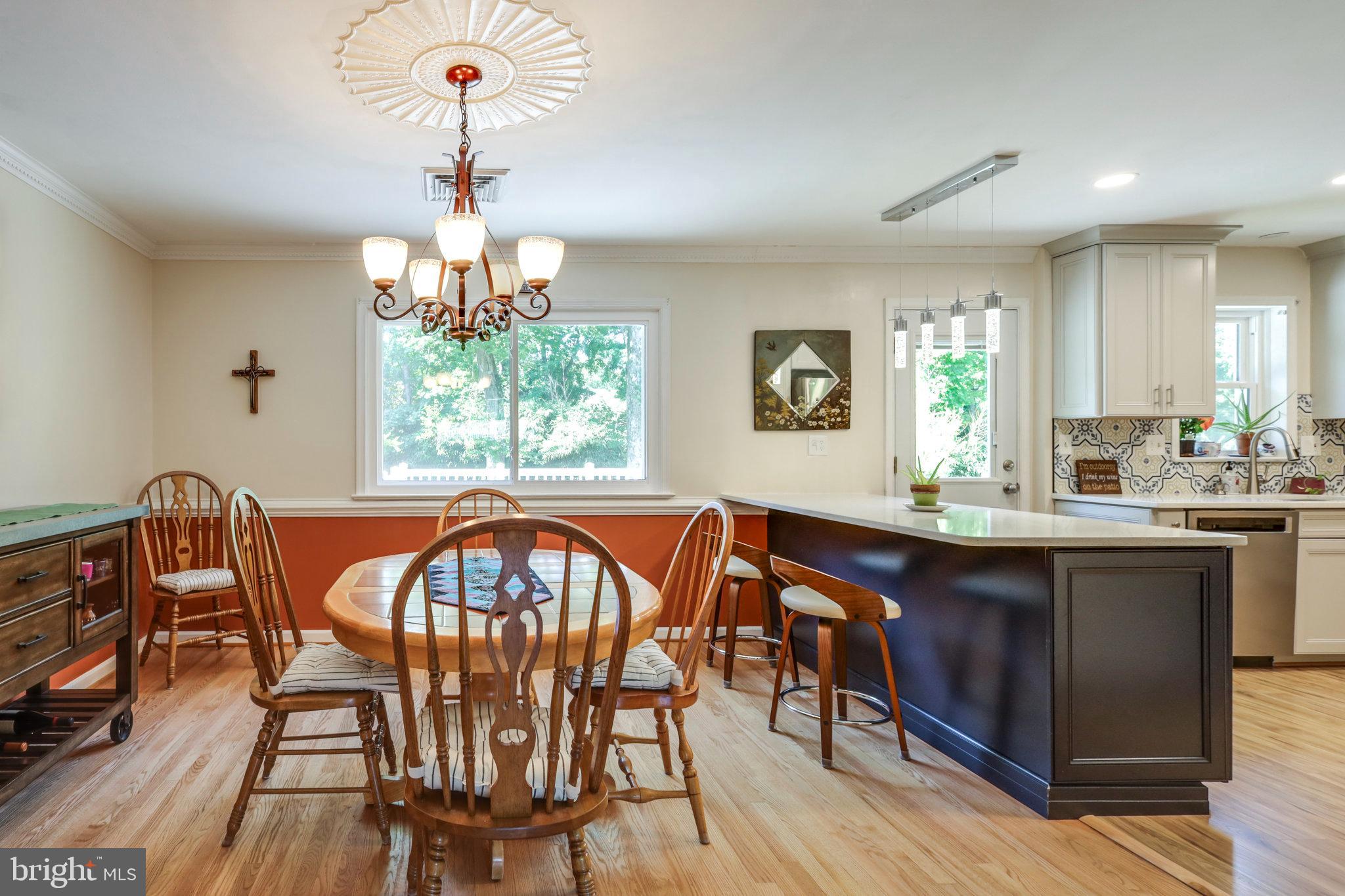 4417 Laurel Road Alexandria, VA 22309 - Photo 7 of 35 Dining room and kitchen breakfast bar