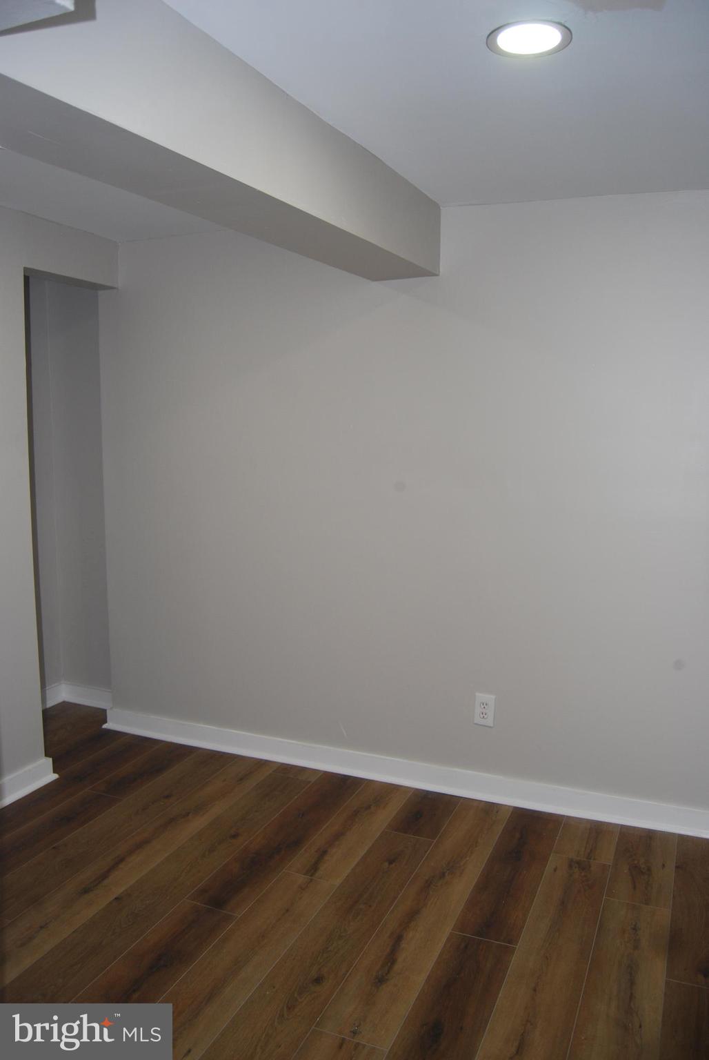 2400 Ridgely Street Baltimore, MD 21230 - Photo 17 of 20 a view of an empty room with wooden floor