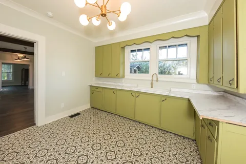 a bathroom with a sink a mirror and a bathtub