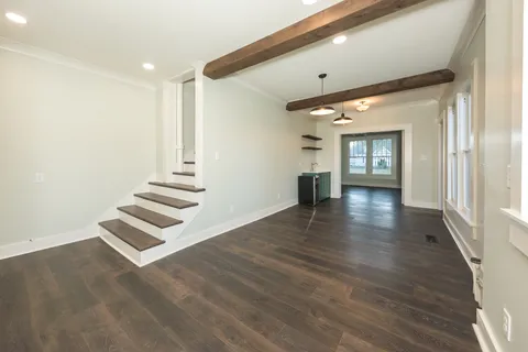 a view of entryway with wooden floor