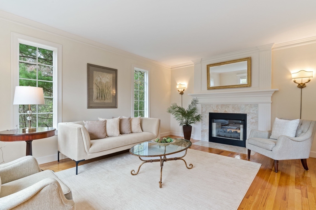 19 Buttonwood Drive Andover, MA 01810 - Photo 12 of 42 a living room with furniture and a fireplace