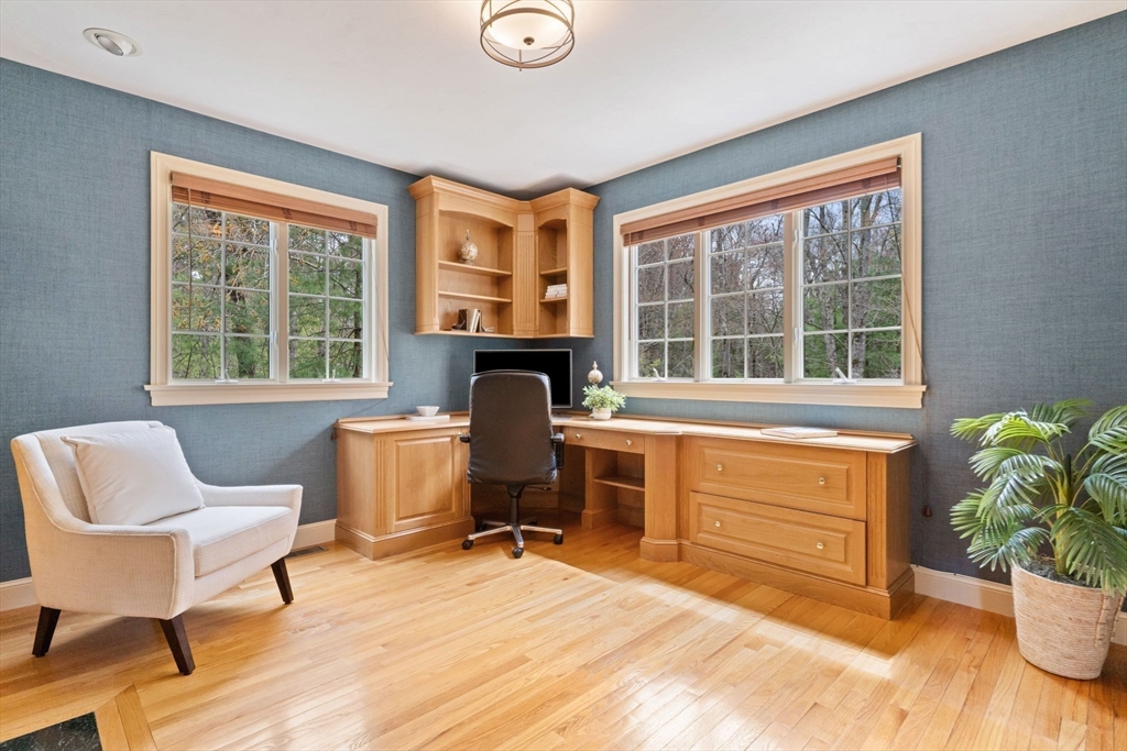 19 Buttonwood Drive Andover, MA 01810 - Photo 14 of 42 a living room with furniture and a window