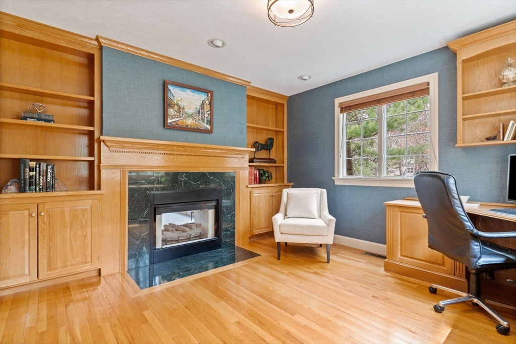 19 Buttonwood Drive Andover, MA 01810 - Photo 15 of 42 a living room with furniture and a fireplace