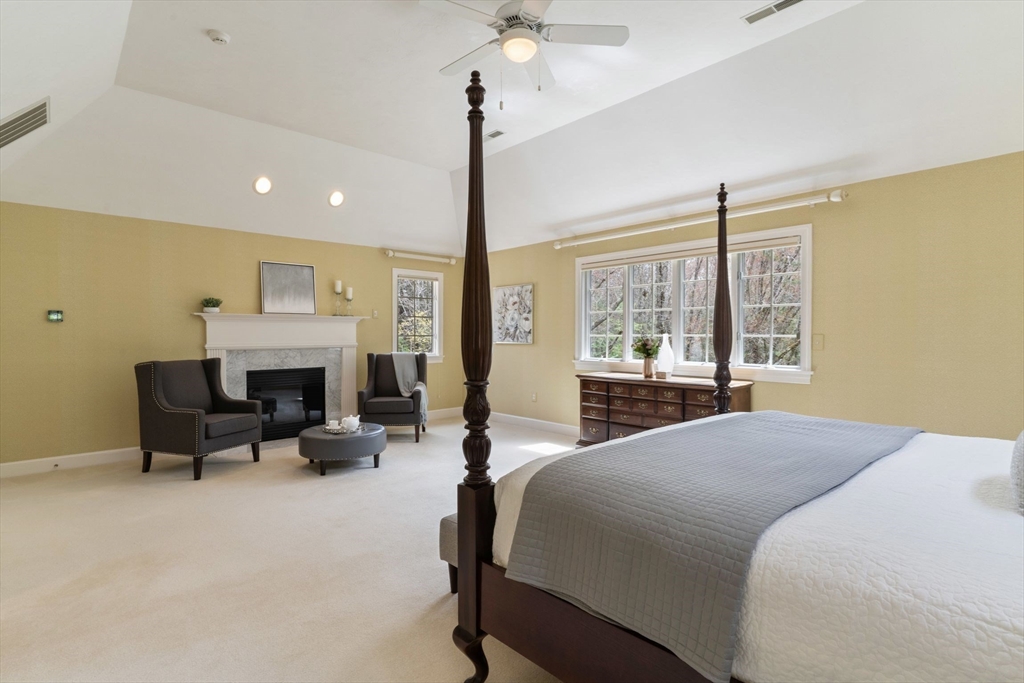 19 Buttonwood Drive Andover, MA 01810 - Photo 18 of 42 a bed room with a bed and a fireplace