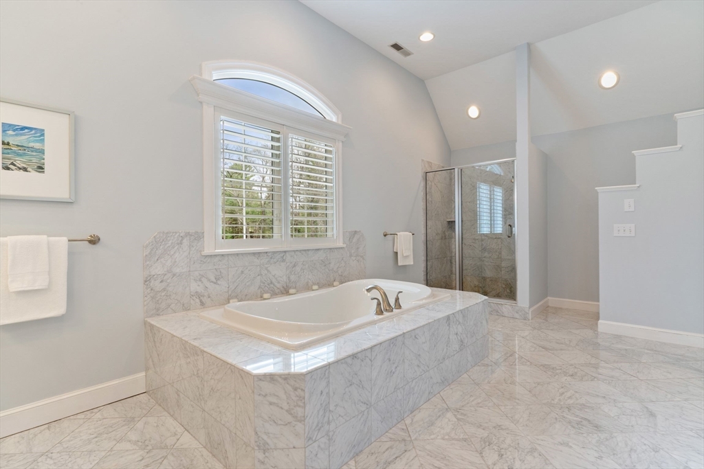 19 Buttonwood Drive Andover, MA 01810 - Photo 21 of 42 a spacious bathroom with a tub a shower and double vanity