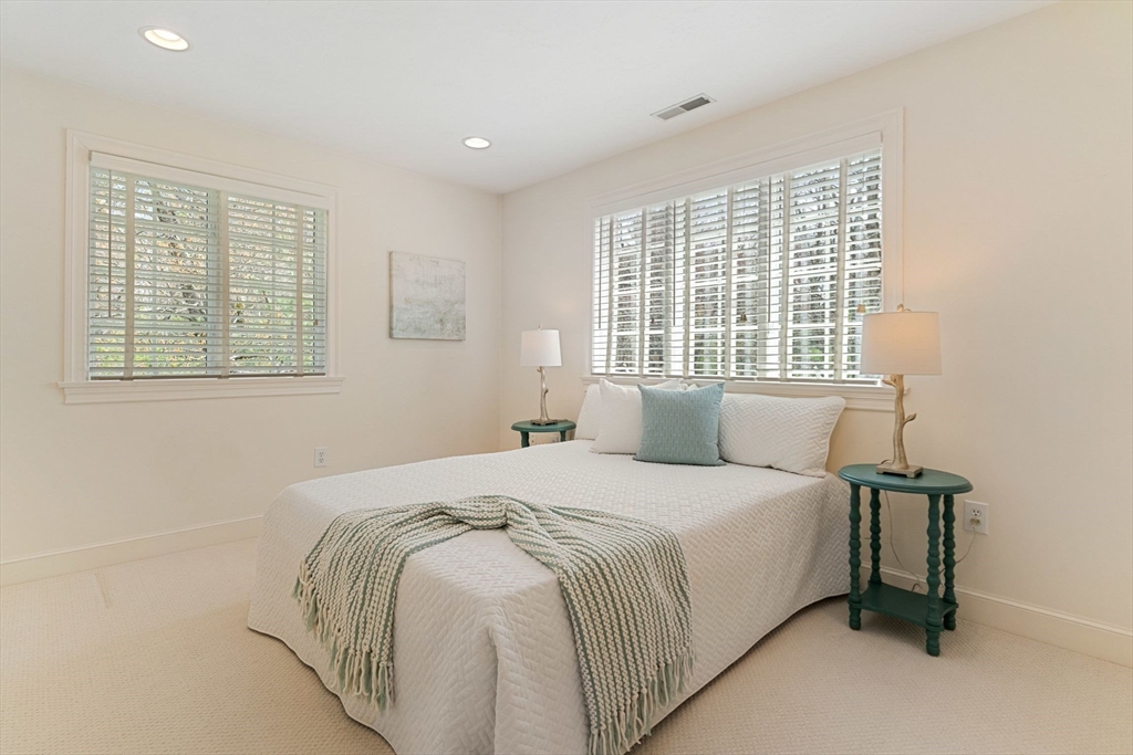 19 Buttonwood Drive Andover, MA 01810 - Photo 25 of 42 a bedroom with a bed and a window