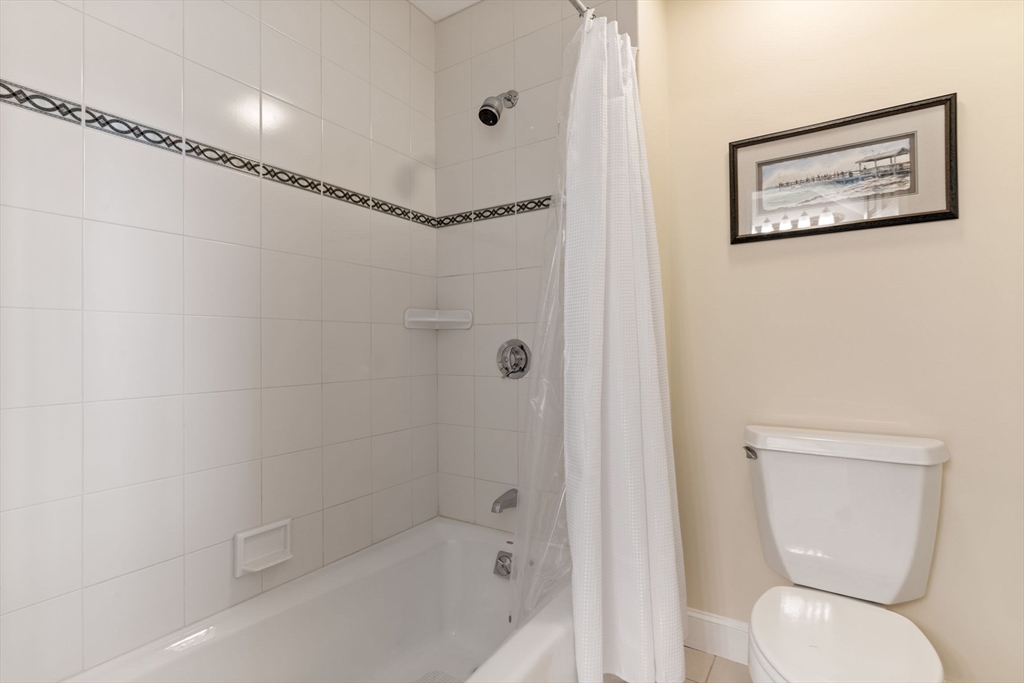 19 Buttonwood Drive Andover, MA 01810 - Photo 28 of 42 a bathroom with a toilet sink and shower