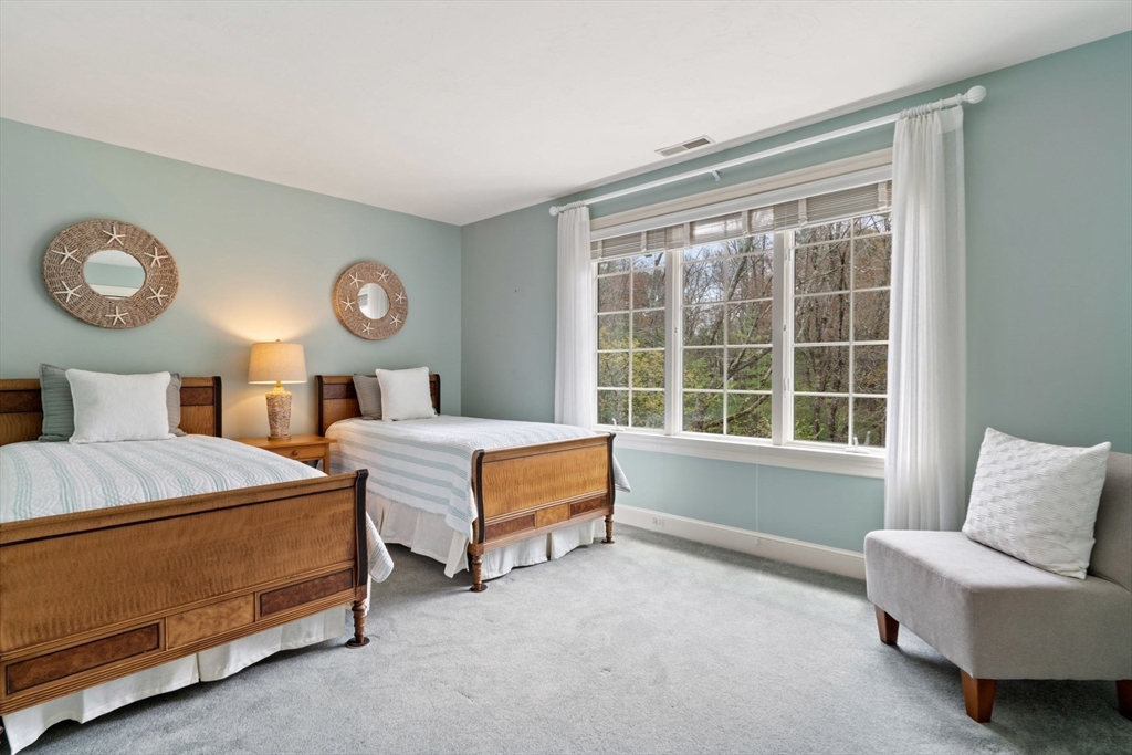 19 Buttonwood Drive Andover, MA 01810 - Photo 29 of 42 a bedroom with a bed and a window