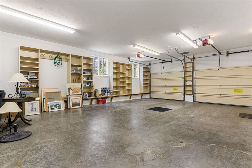 19 Buttonwood Drive Andover, MA 01810 - Photo 37 of 42 a view of a livingroom with workspace and a window