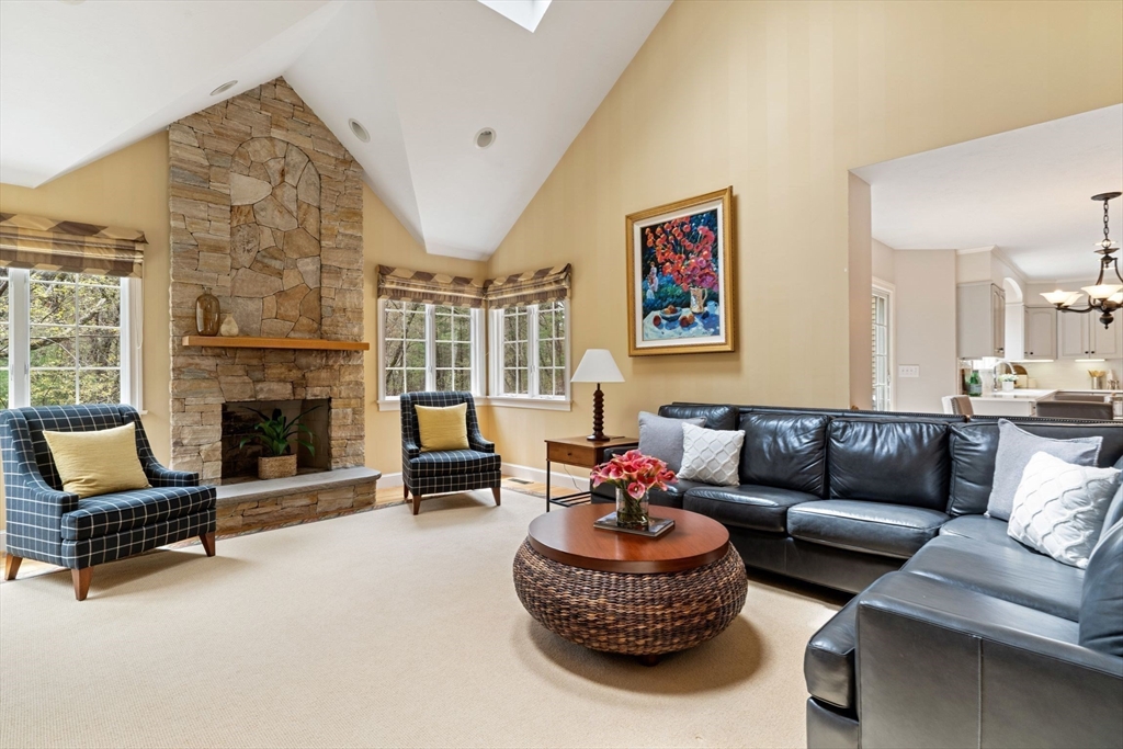 19 Buttonwood Drive Andover, MA 01810 - Photo 9 of 42 a living room with furniture and a fireplace