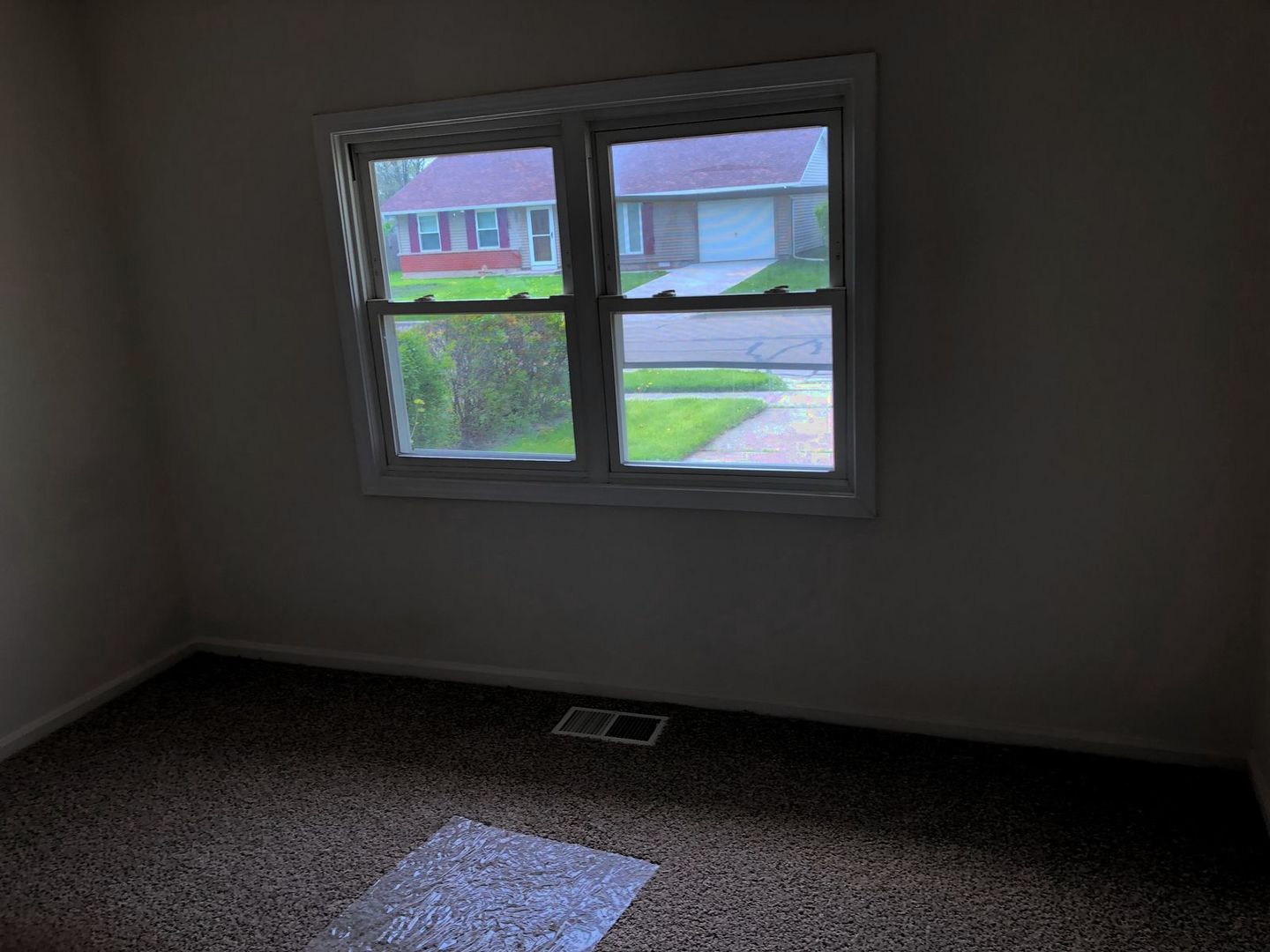110 McKool Avenue Romeoville, IL 60446 - Photo 11 of 17 a view of an empty room with a window