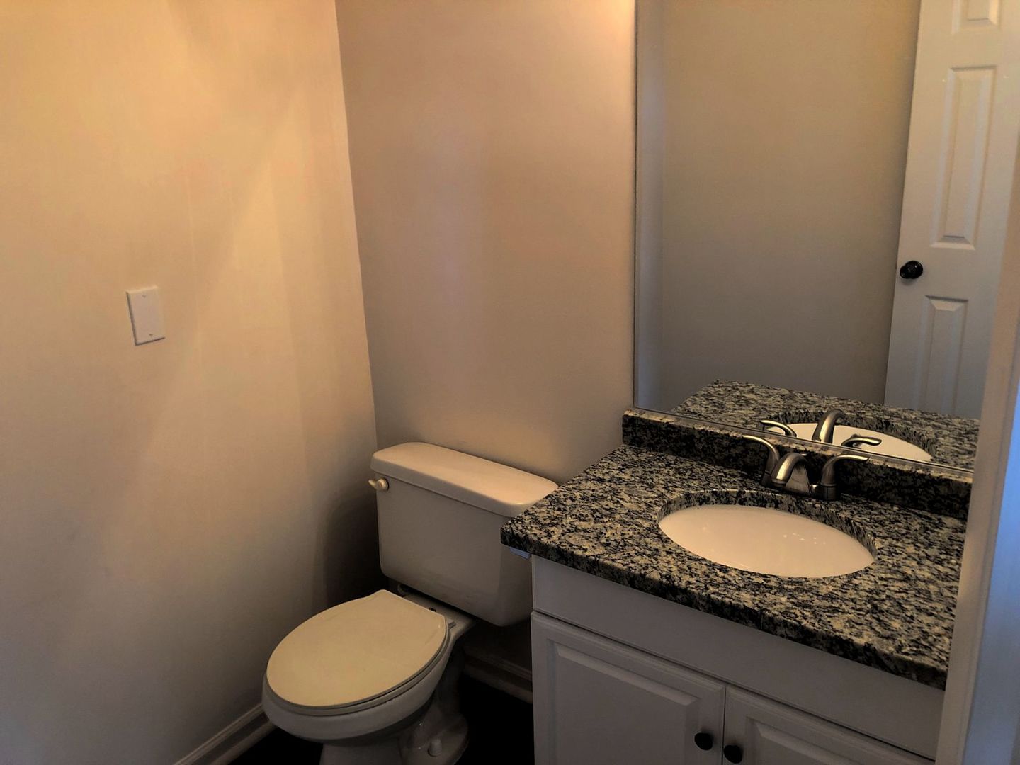 110 McKool Avenue Romeoville, IL 60446 - Photo 12 of 17 a bathroom with a granite countertop toilet and a sink