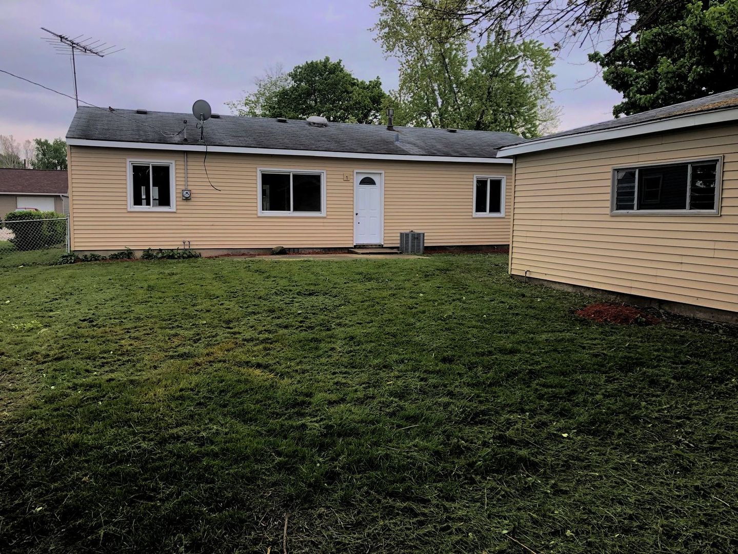 110 McKool Avenue Romeoville, IL 60446 - Photo 15 of 17 a view of a backyard with a garden