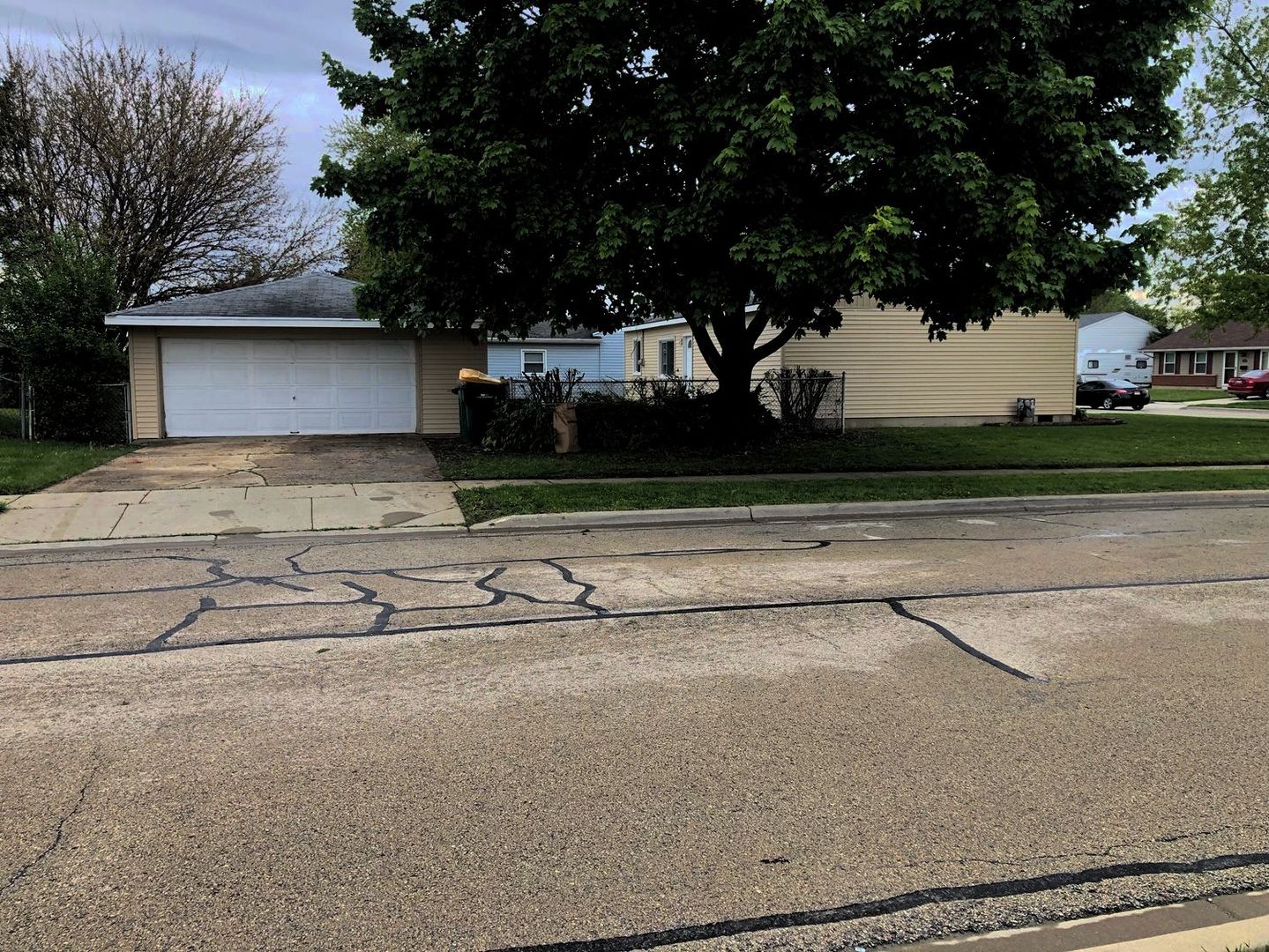 110 McKool Avenue Romeoville, IL 60446 - Photo 17 of 17 a house that has a tree in front of it