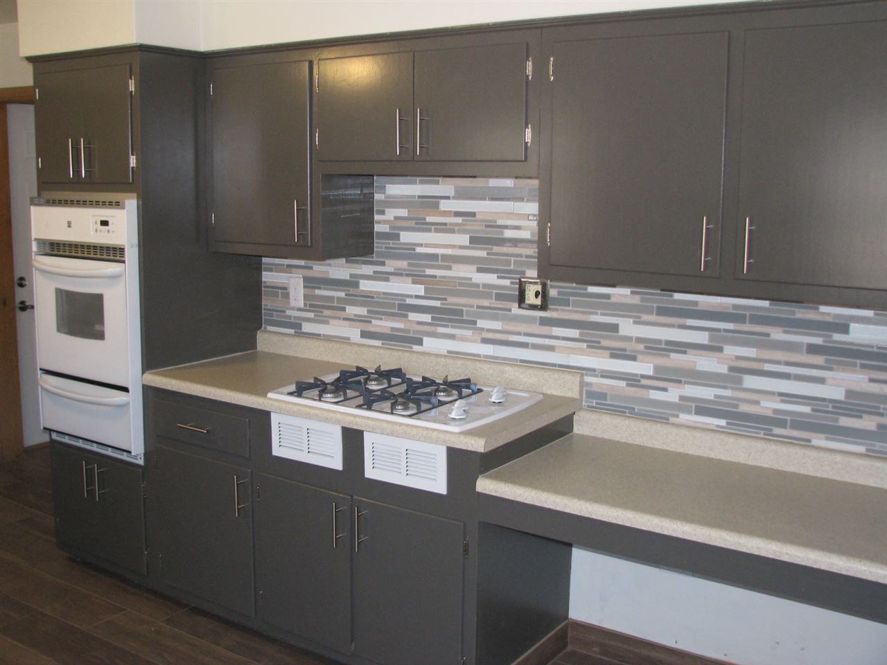 4009 Pinecrest Road Rockford, IL 61107 - Photo 3 of 20 a kitchen with a stove and a refrigerator