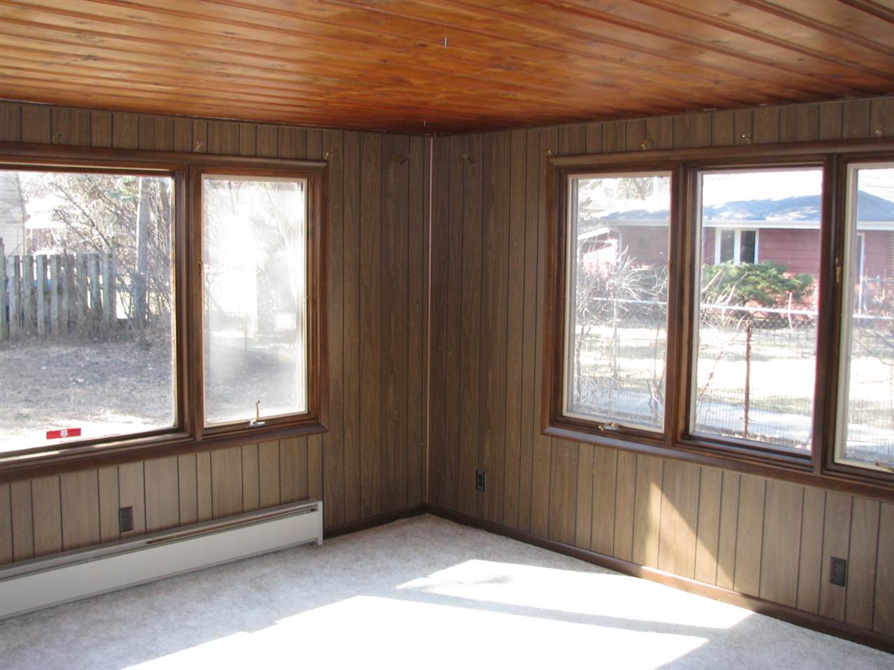 4009 Pinecrest Road Rockford, IL 61107 - Photo 8 of 20 a view of an empty room with a window