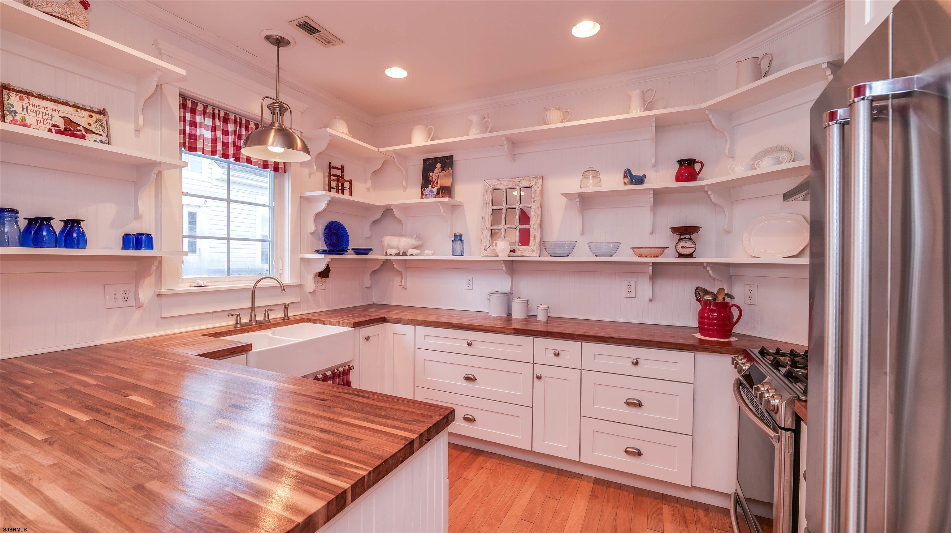 42 Ables Run Drive Absecon, NJ 08201 - Photo 12 of 43 a kitchen with white cabinets and window