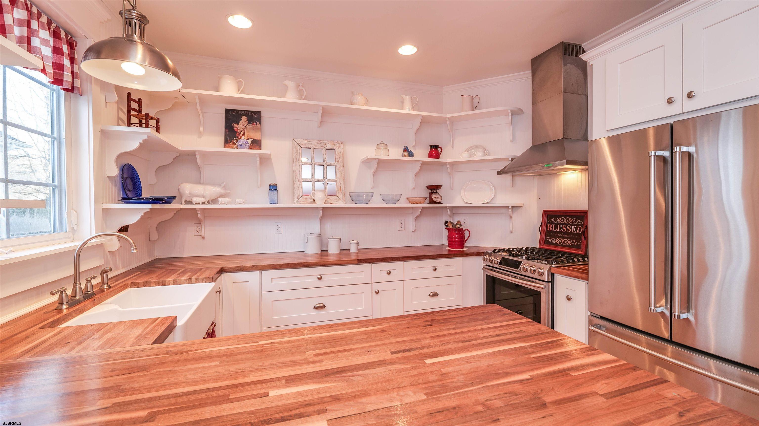 42 Ables Run Drive Absecon, NJ 08201 - Photo 14 of 43 a kitchen with stainless steel appliances granite countertop a sink stove and refrigerator