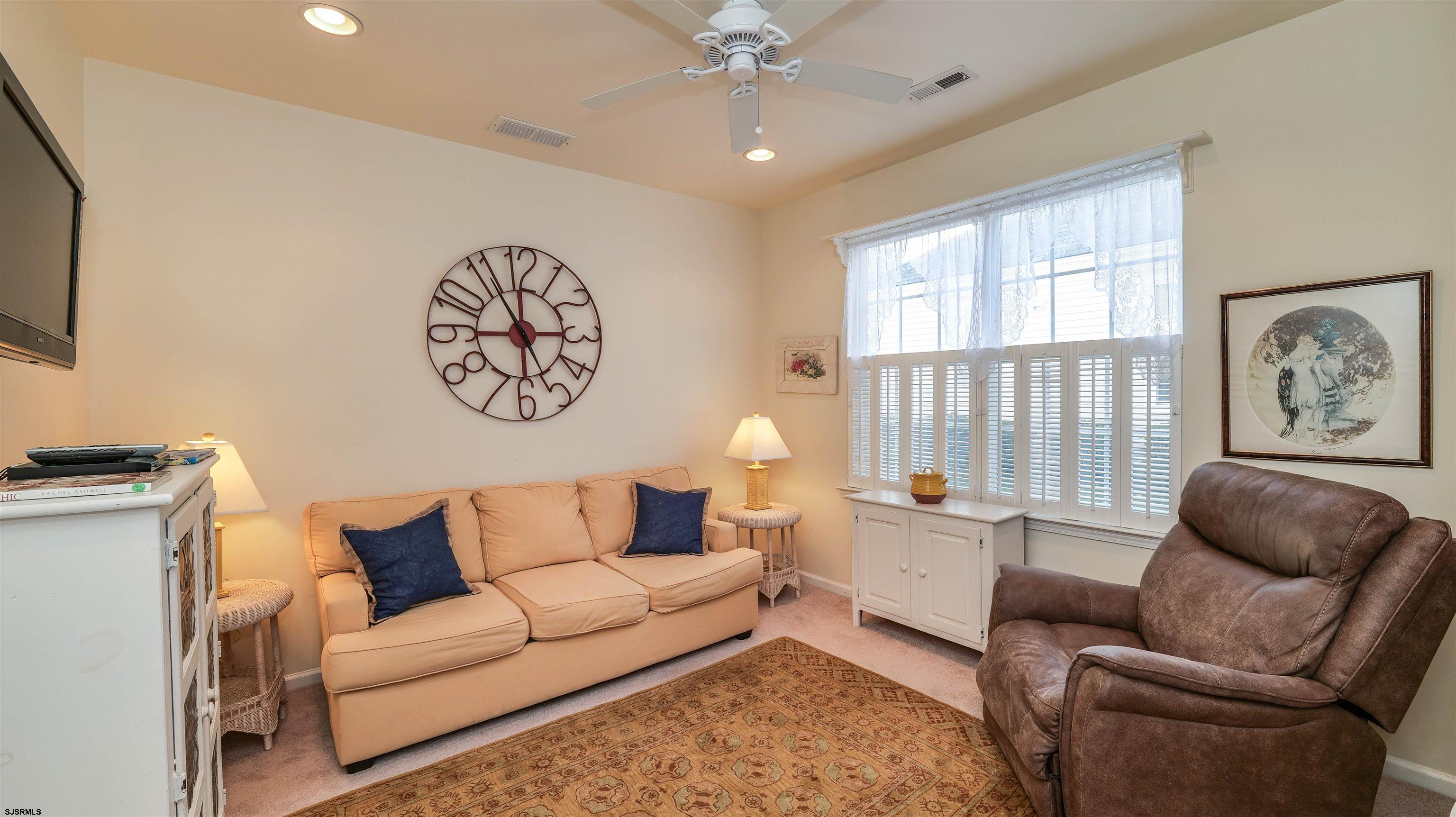 42 Ables Run Drive Absecon, NJ 08201 - Photo 17 of 43 a living room with furniture and a large window