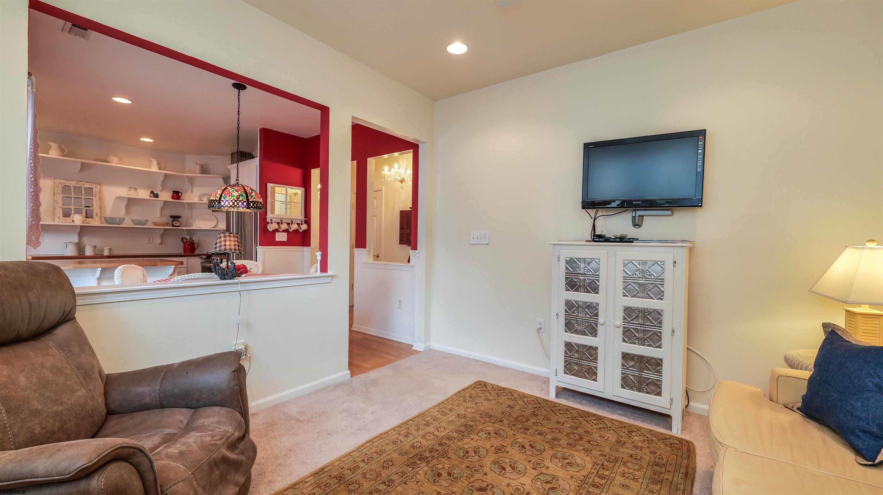 42 Ables Run Drive Absecon, NJ 08201 - Photo 18 of 43 a living room with furniture and a flat screen tv