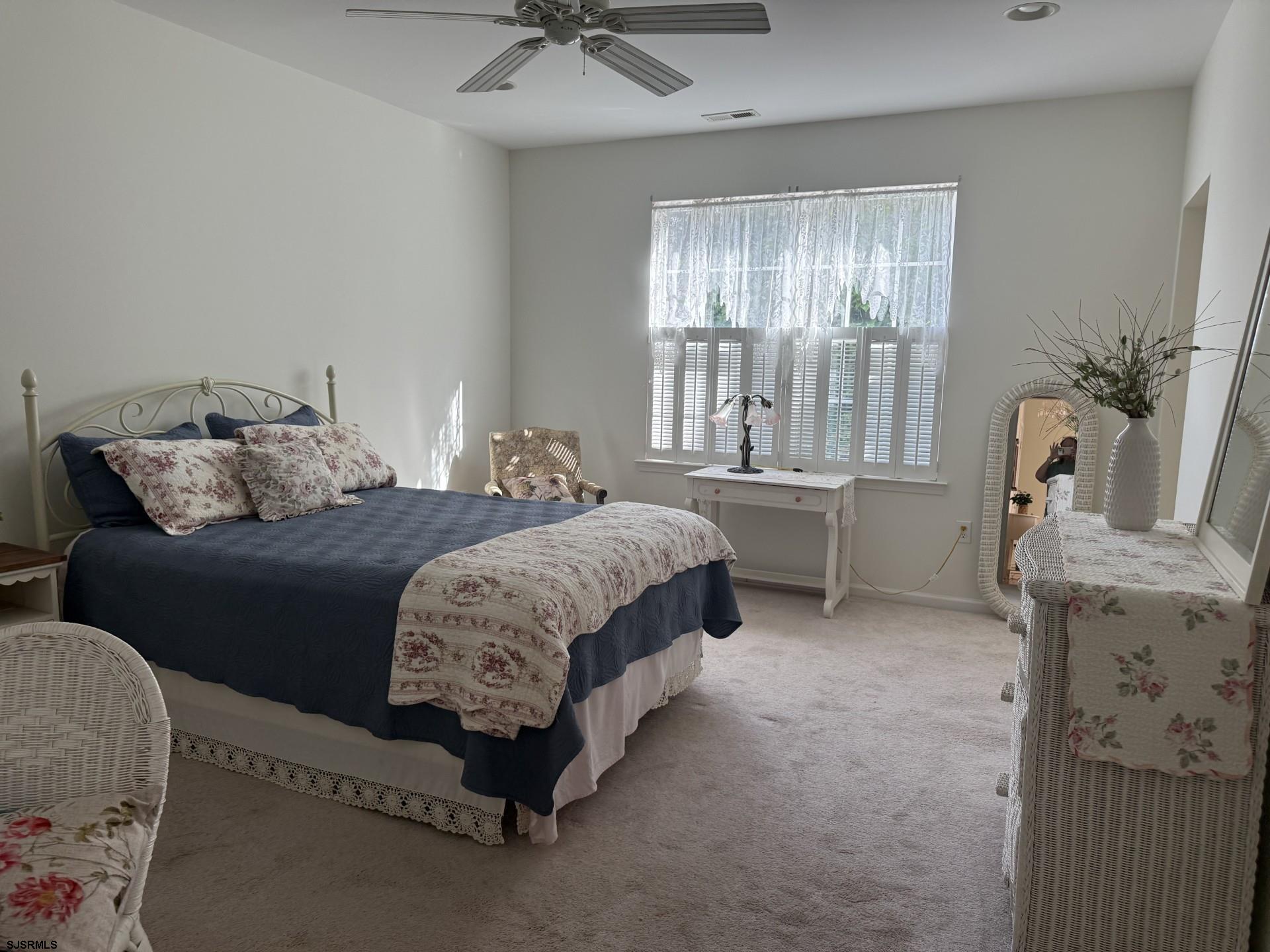 42 Ables Run Drive Absecon, NJ 08201 - Photo 19 of 43 a bedroom with a bed a table and chair