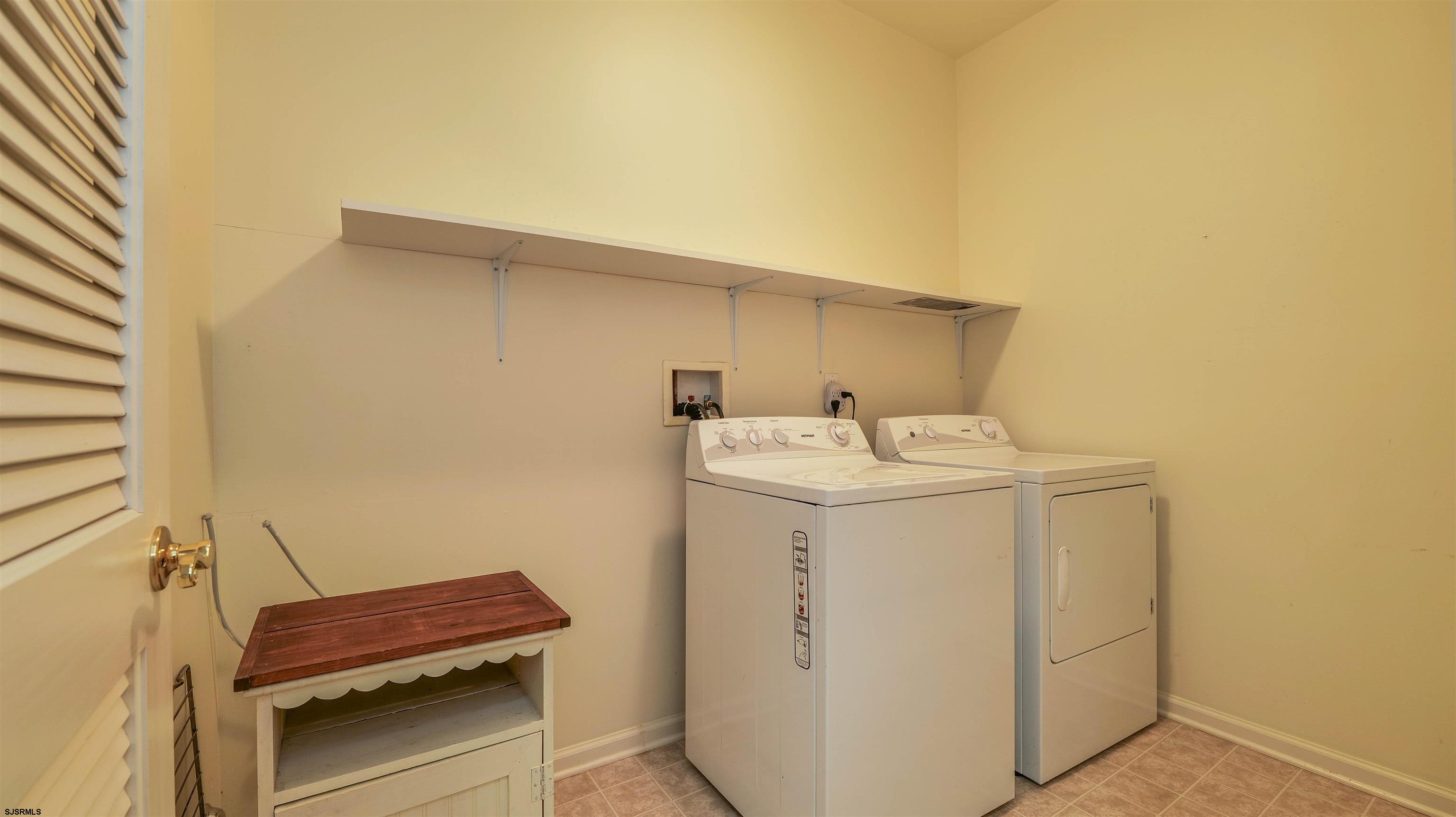42 Ables Run Drive Absecon, NJ 08201 - Photo 23 of 43 a utility room with dryer and washer