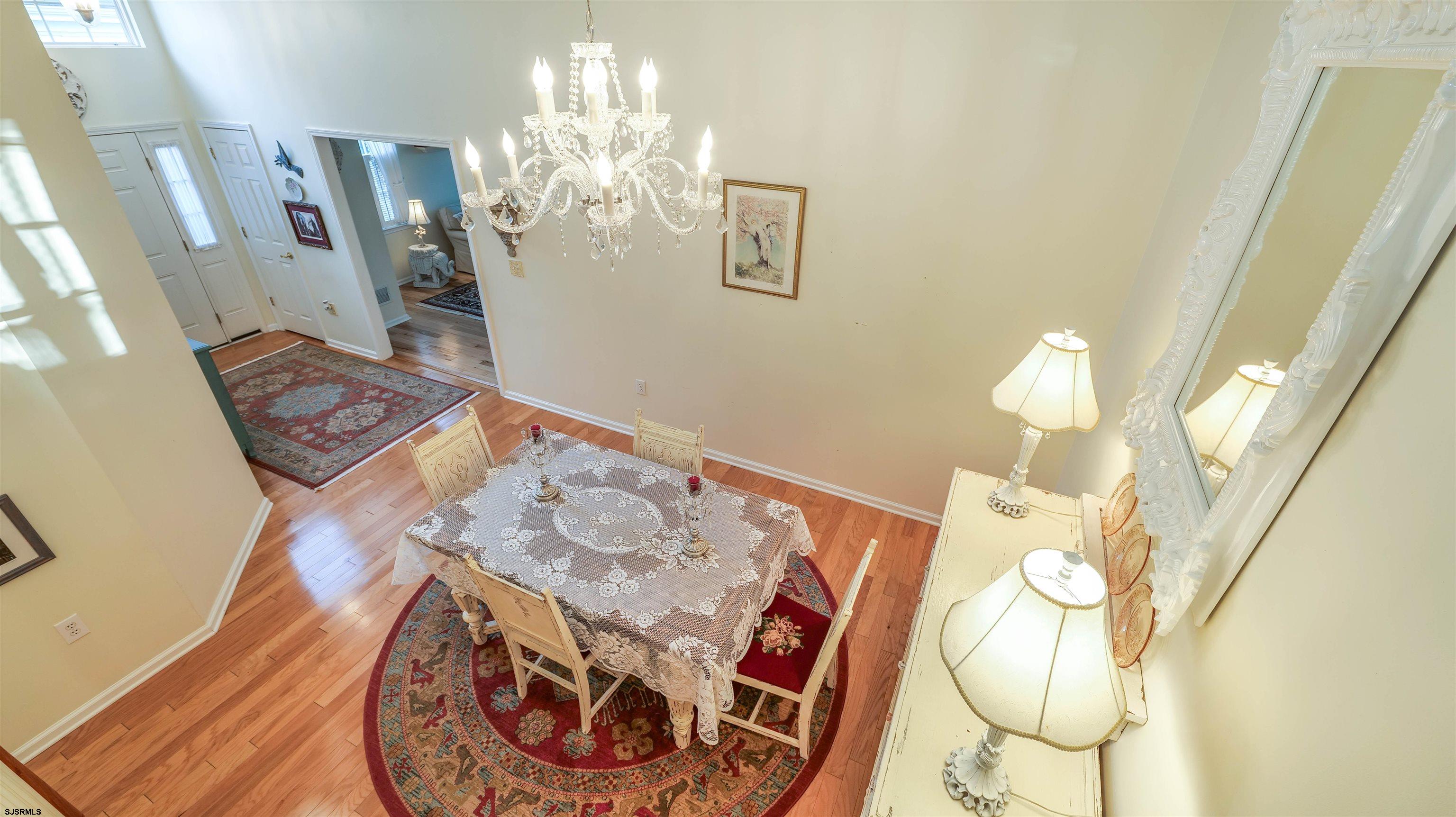 42 Ables Run Drive Absecon, NJ 08201 - Photo 26 of 43 a view of a dining room with furniture and chandelier