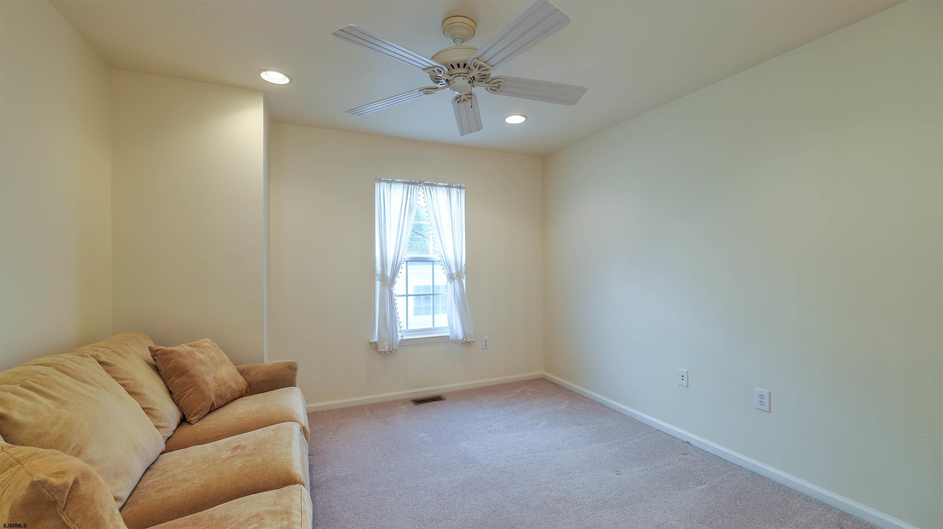 42 Ables Run Drive Absecon, NJ 08201 - Photo 28 of 43 a living room with furniture and a window