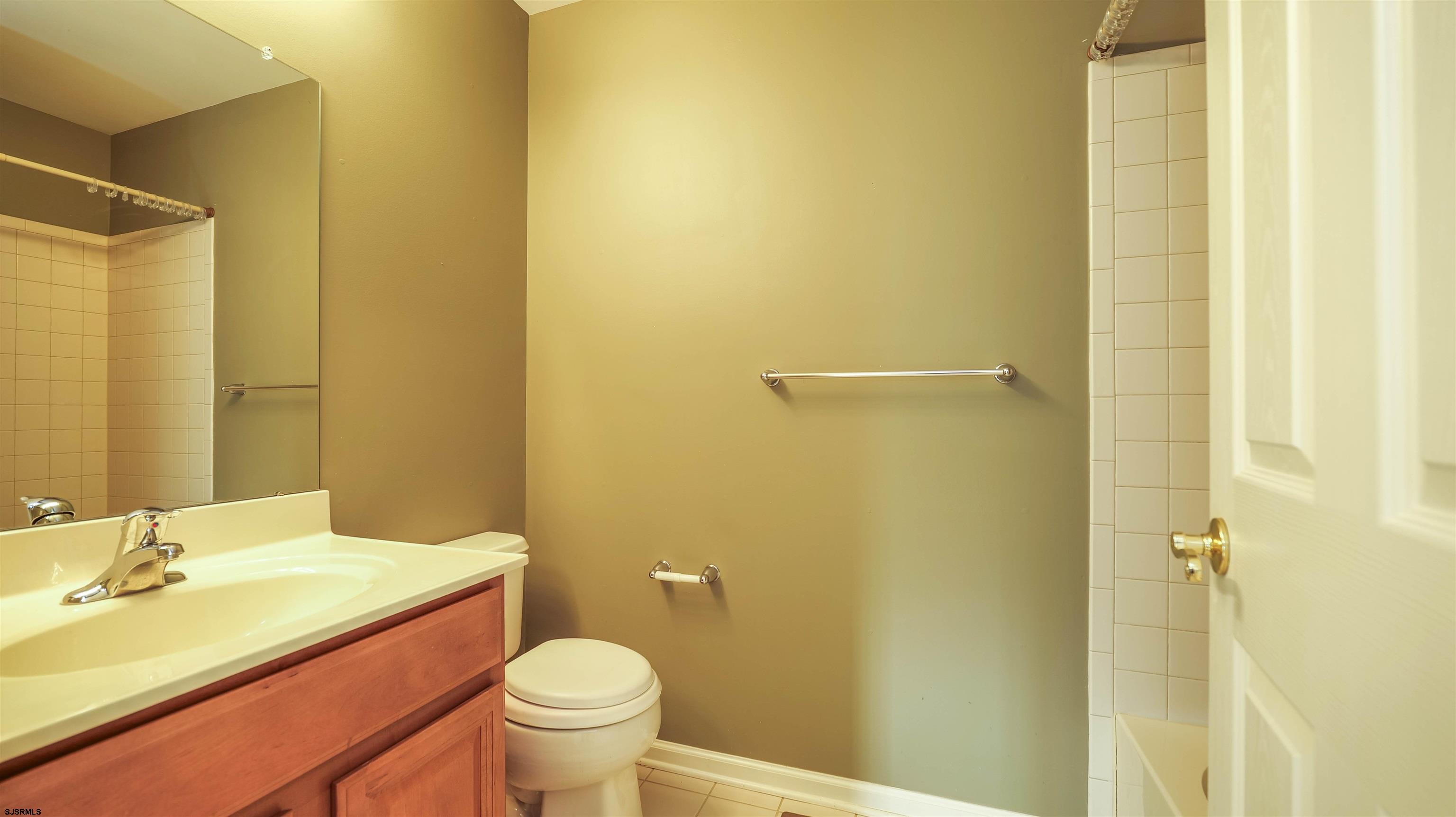 42 Ables Run Drive Absecon, NJ 08201 - Photo 34 of 43 a bathroom with a sink and toilet