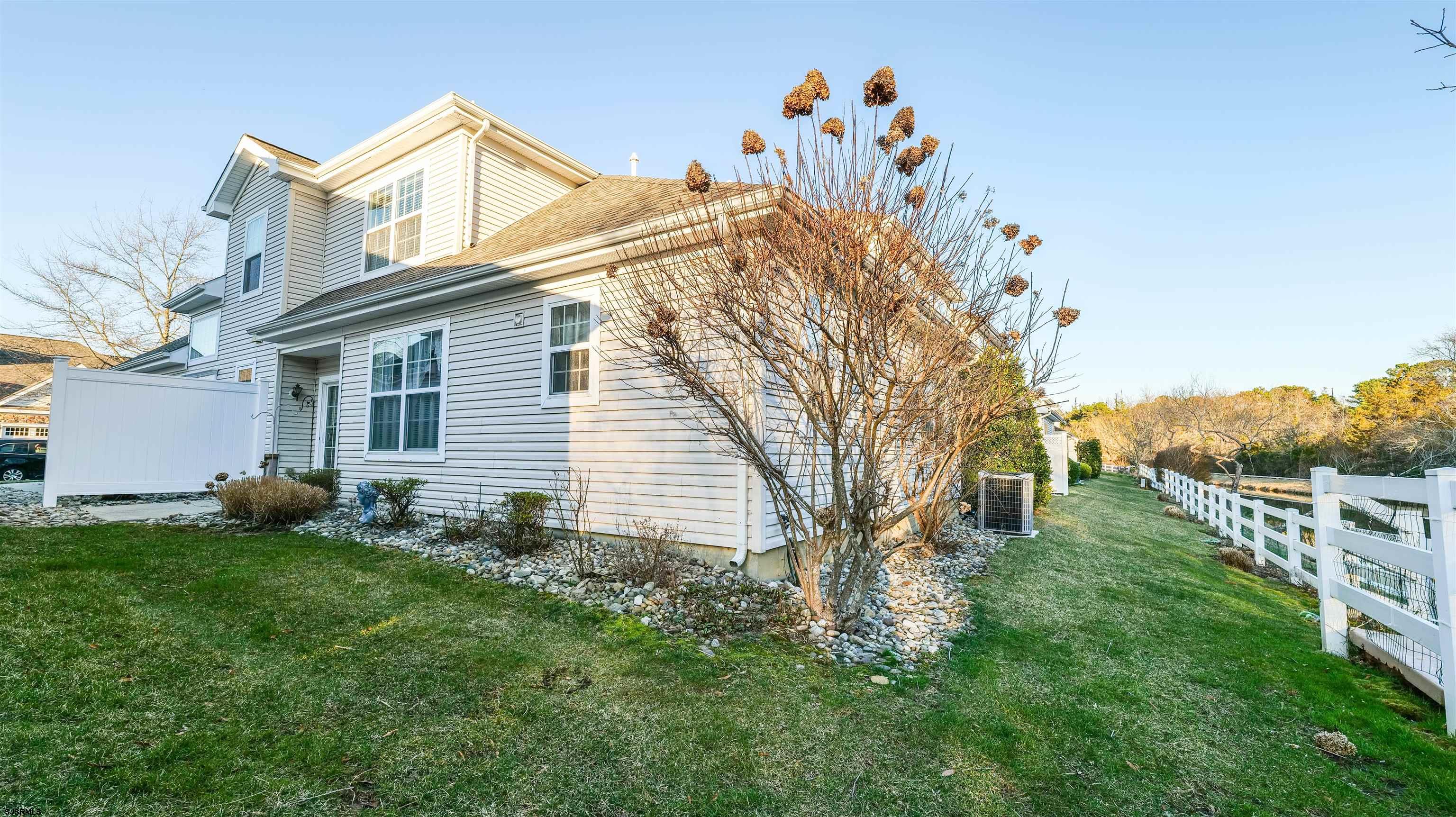 42 Ables Run Drive Absecon, NJ 08201 - Photo 37 of 43 a view of backyard with a garden and plants