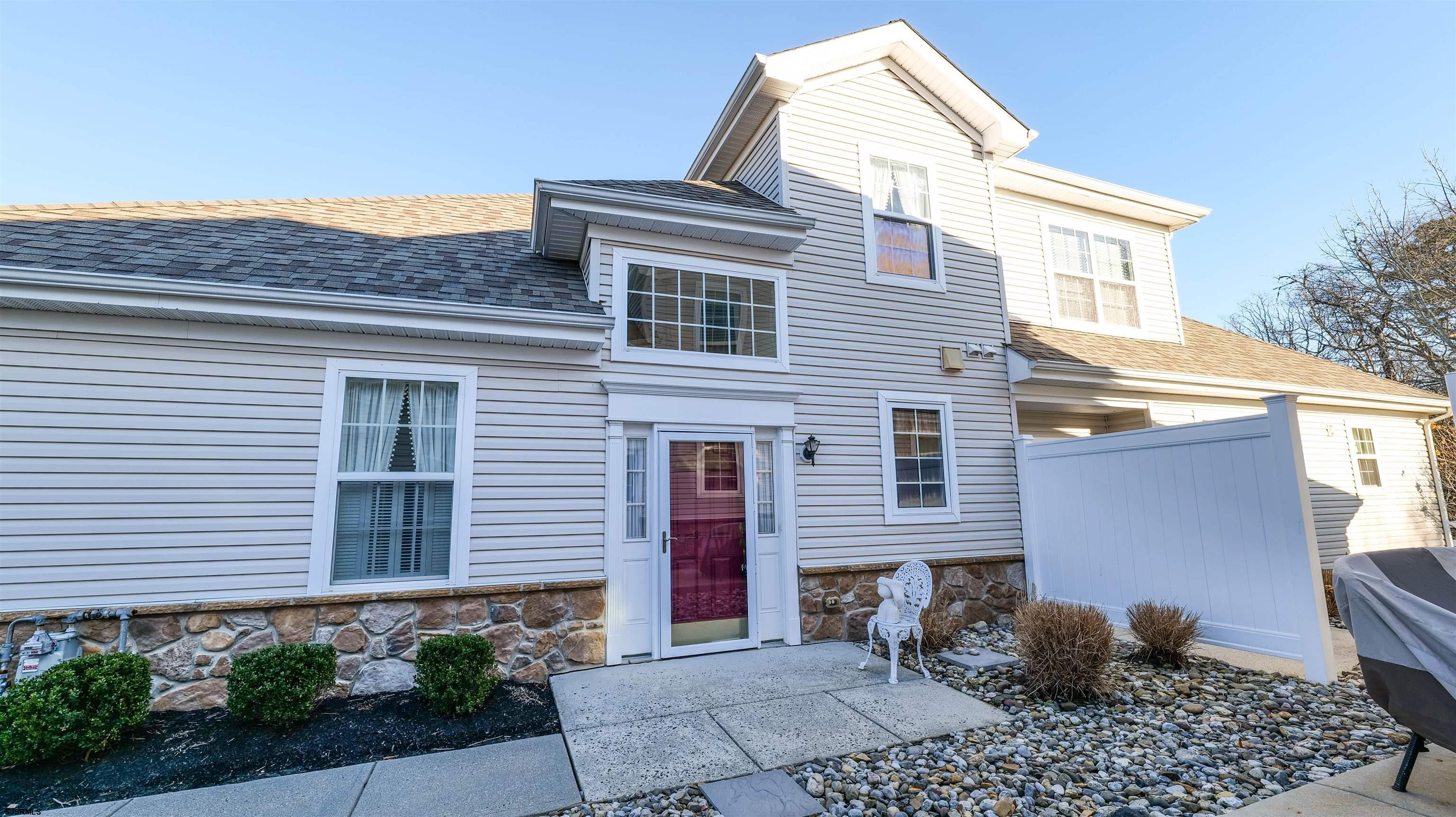 42 Ables Run Drive Absecon, NJ 08201 - Photo 4 of 43 a house view with a backyard and a garden