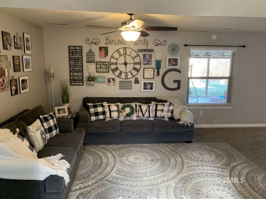 217 Rancho Street Ridgecrest, CA 93555 - Photo 3 of 25 a bedroom with furniture and a window