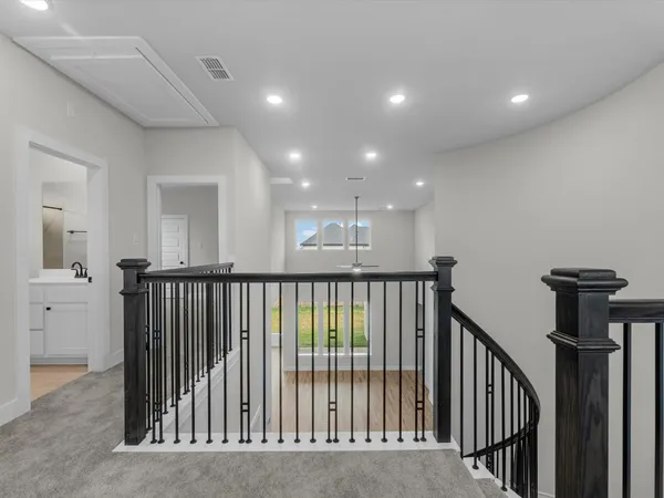 a view of hallway with stairs