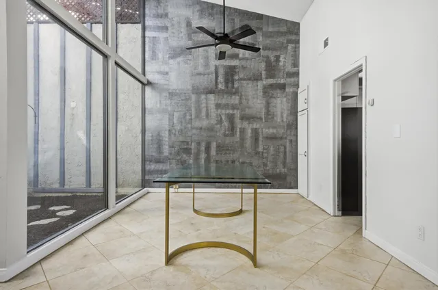 a bathroom with a shower and a bathtub