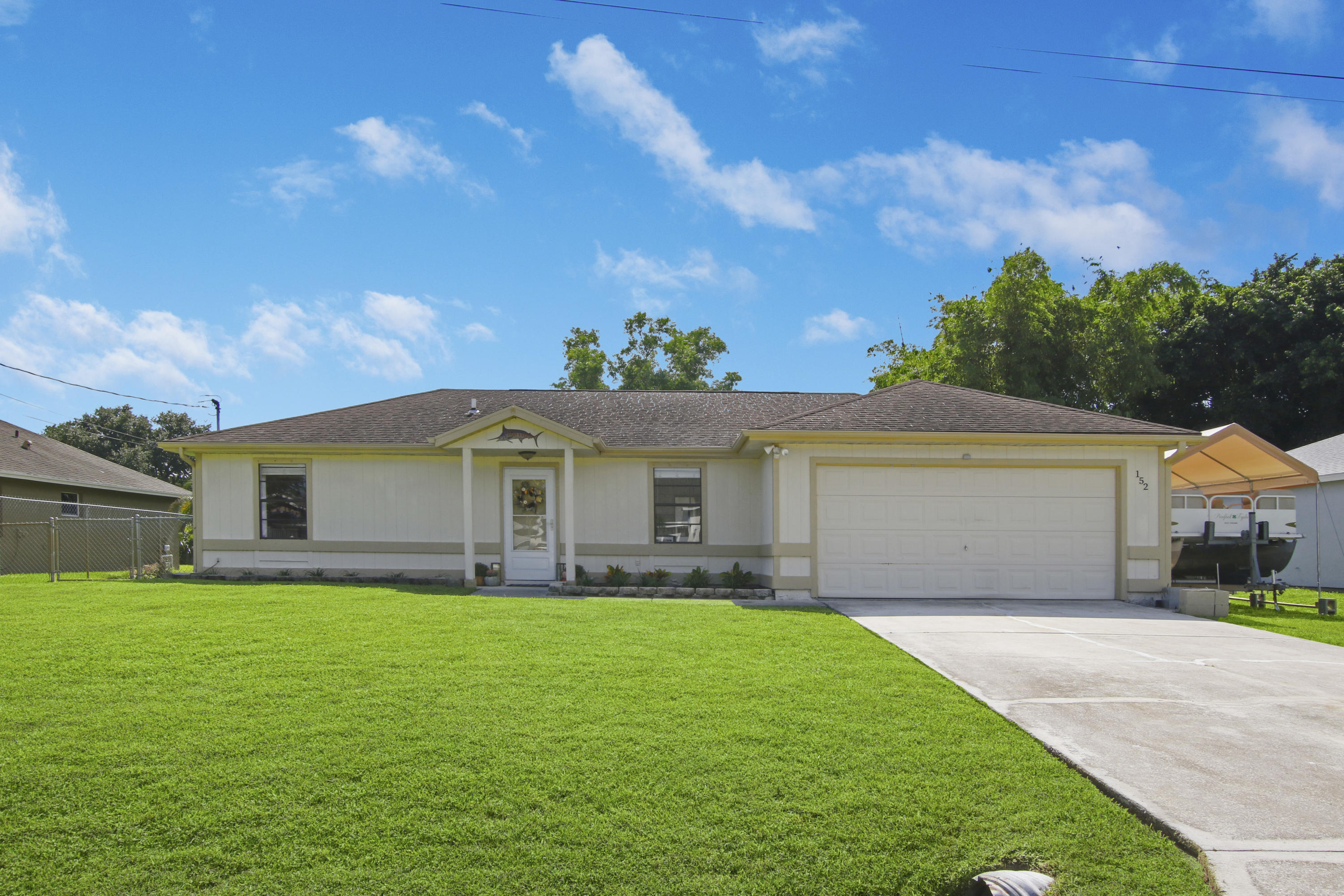 152 Southwest Covington Road Port St. Lucie, FL 34953 - Photo 1 of 26 House-5