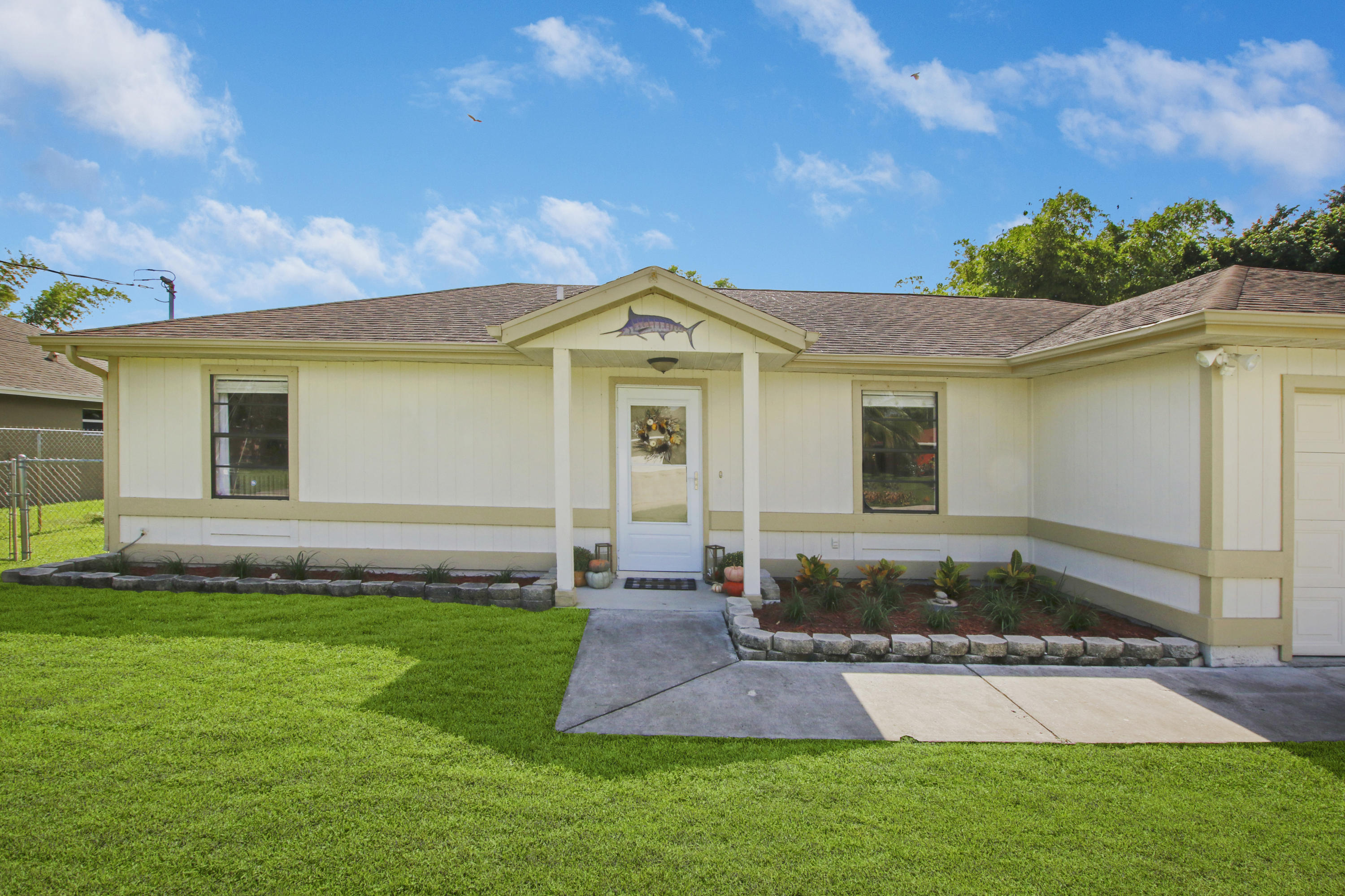152 Southwest Covington Road Port St. Lucie, FL 34953 - Photo 2 of 26 House-4