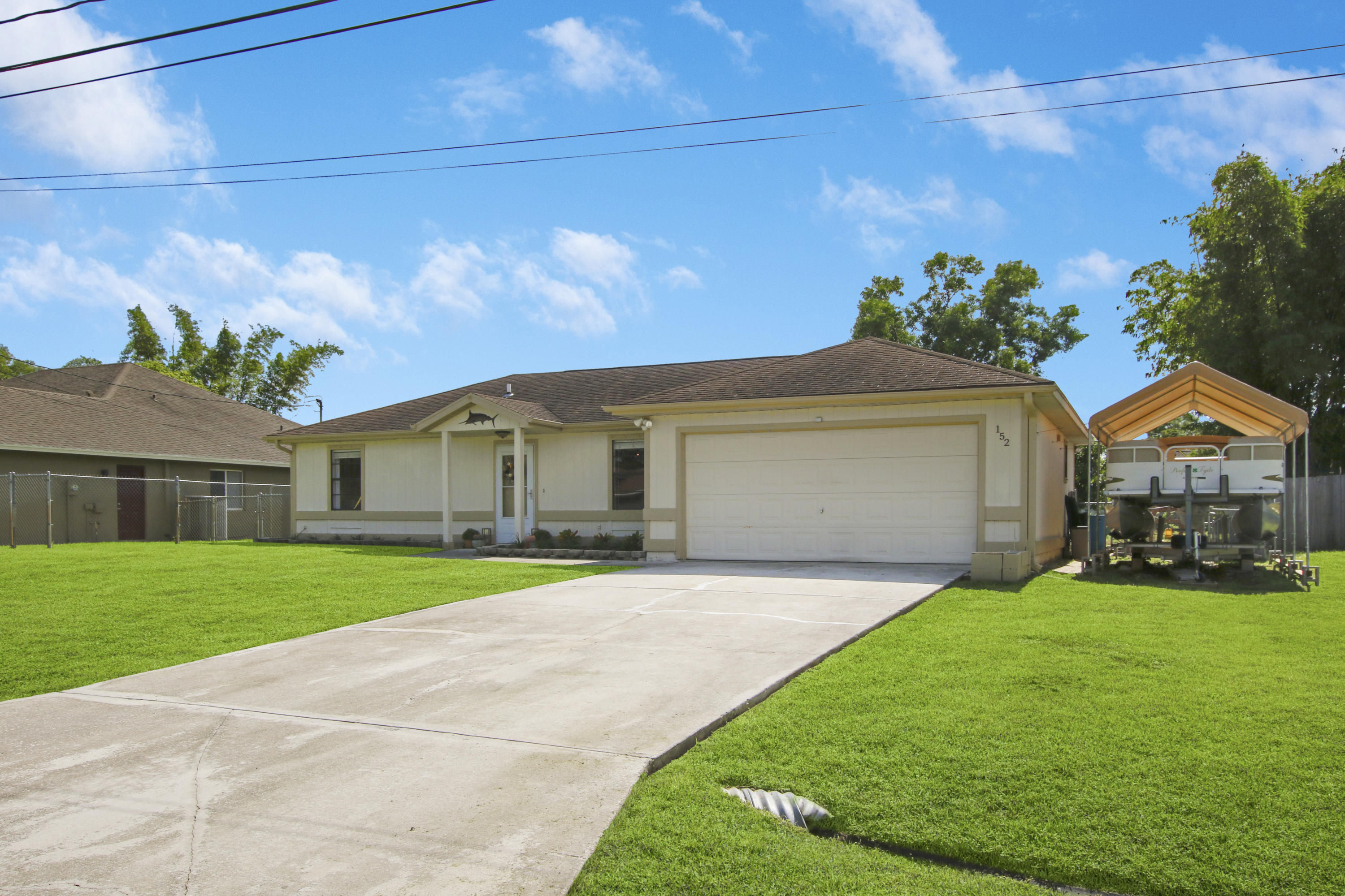 152 Southwest Covington Road Port St. Lucie, FL 34953 - Photo 3 of 26 House-6