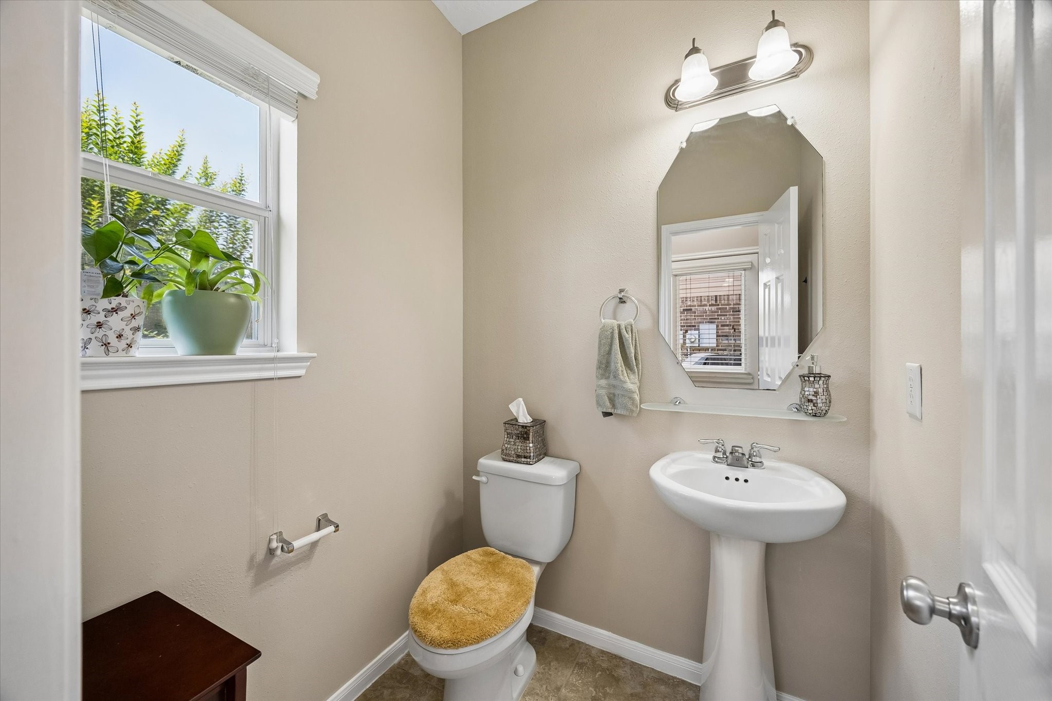 8433 Sunset Loch Drive Spring, TX 77379 - Photo 14 of 25 a bathroom with a sink toilet and a mirror