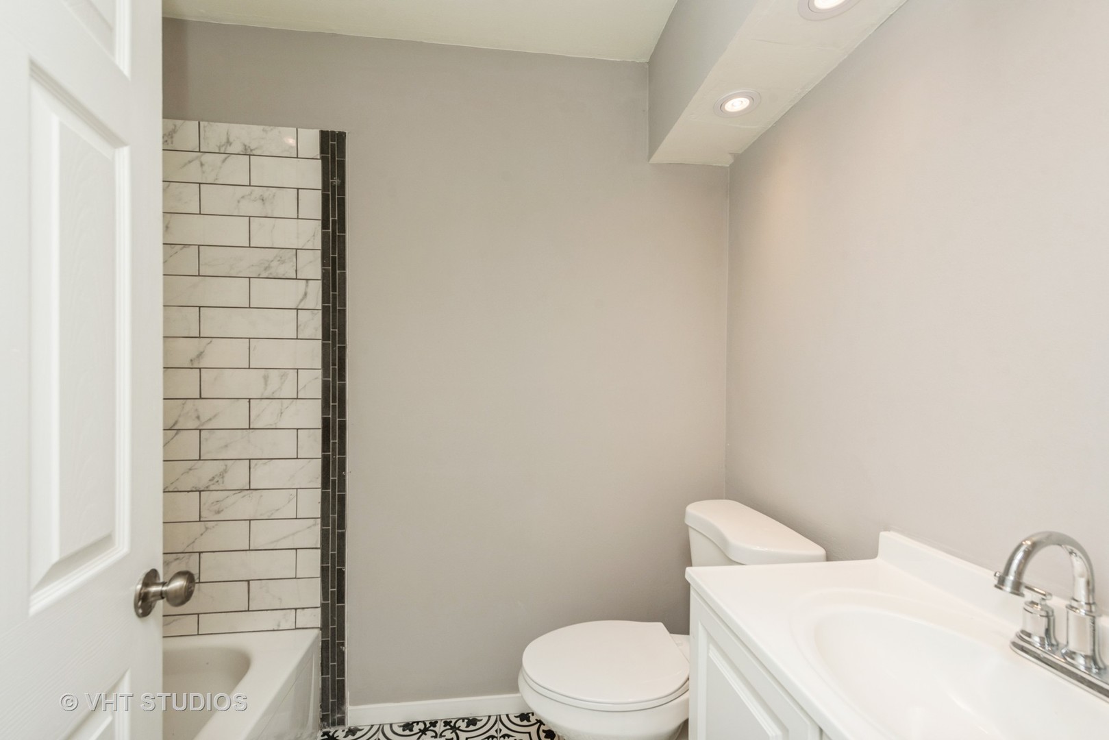 30 Hickory Lane Cary, IL 60013 - Photo 13 of 16 a white toilet sitting next to a bathroom sink