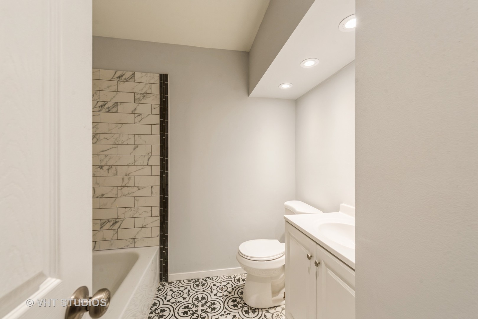 30 Hickory Lane Cary, IL 60013 - Photo 14 of 16 a bathroom with a toilet and a shower