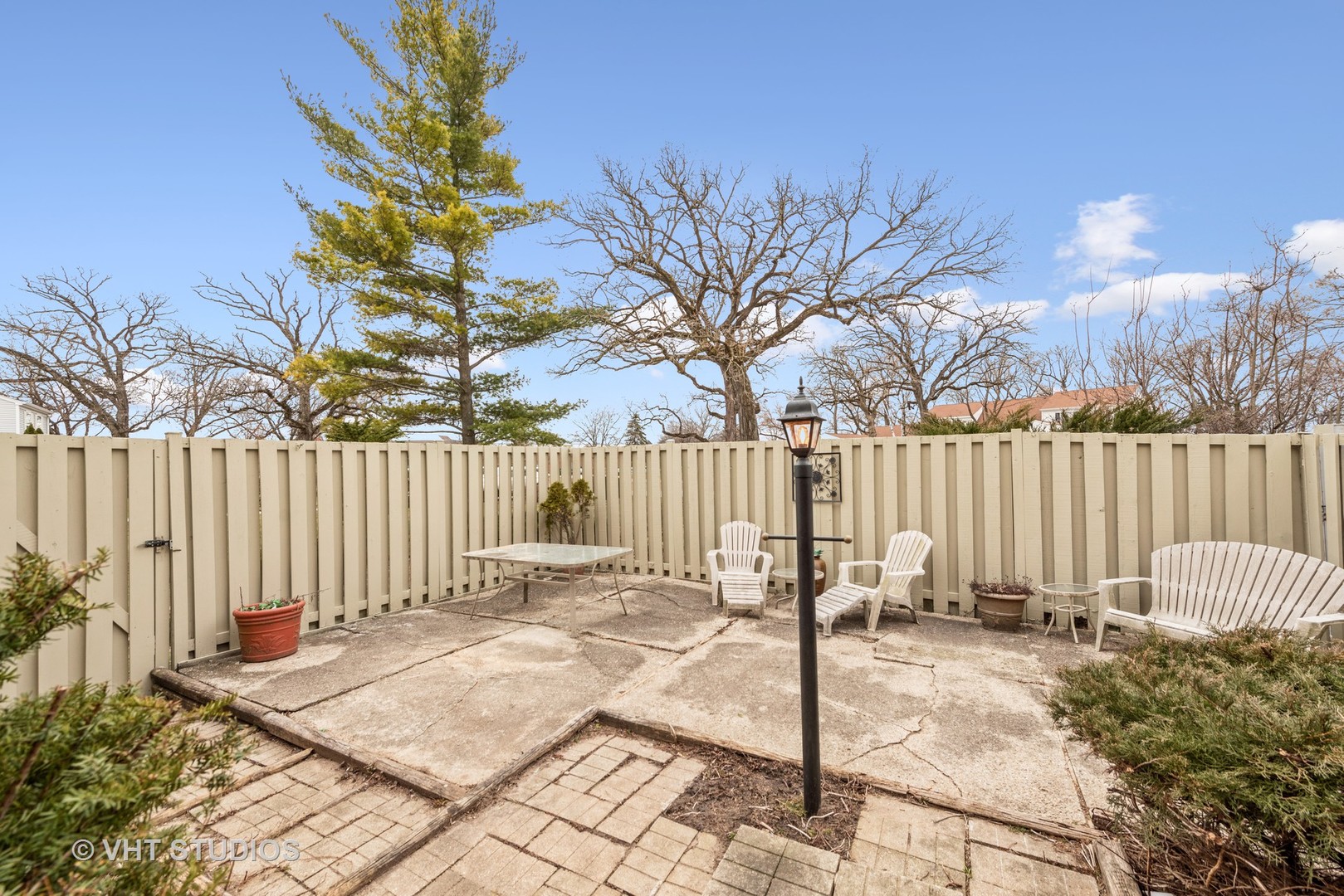 30 Hickory Lane Cary, IL 60013 - Photo 15 of 16 a view of a backyard with wooden fence