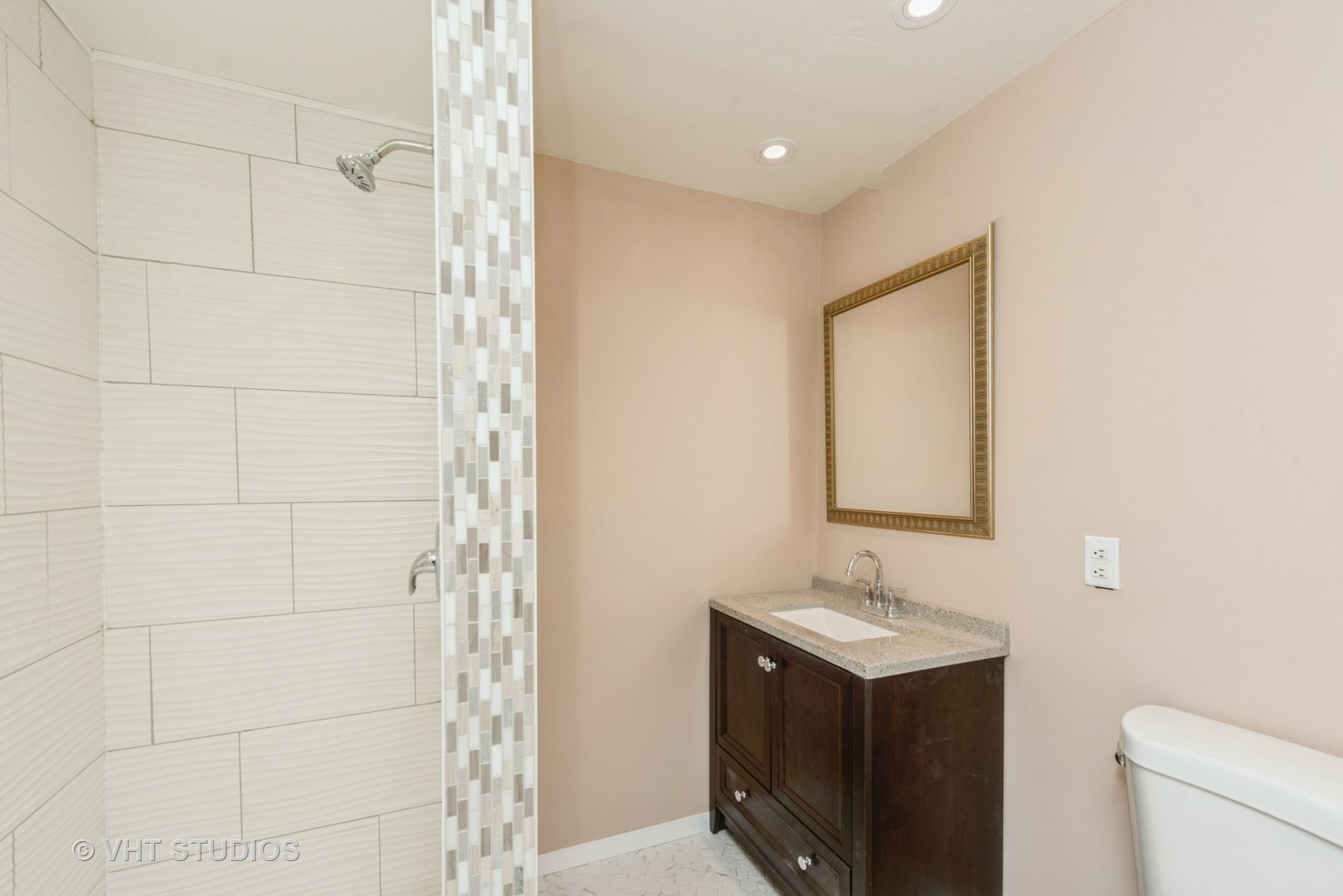 30 Hickory Lane Cary, IL 60013 - Photo 10 of 16 a bathroom with a sink and a mirror